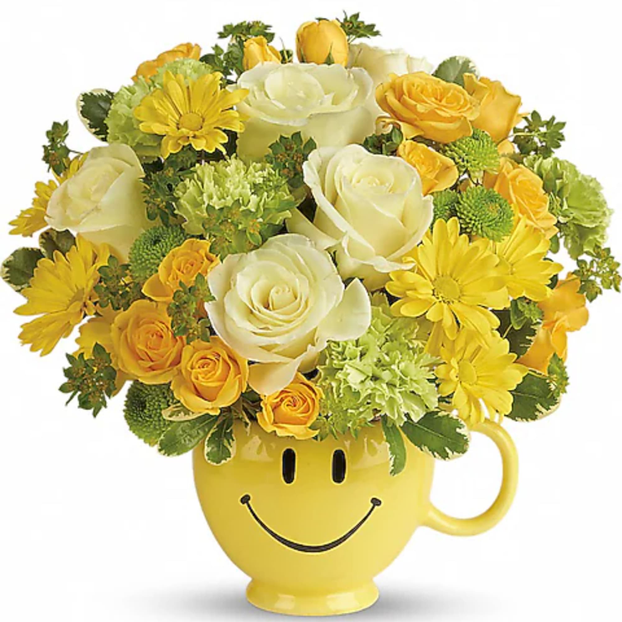 Yellow and white flower arrangement in a smiley-face mug