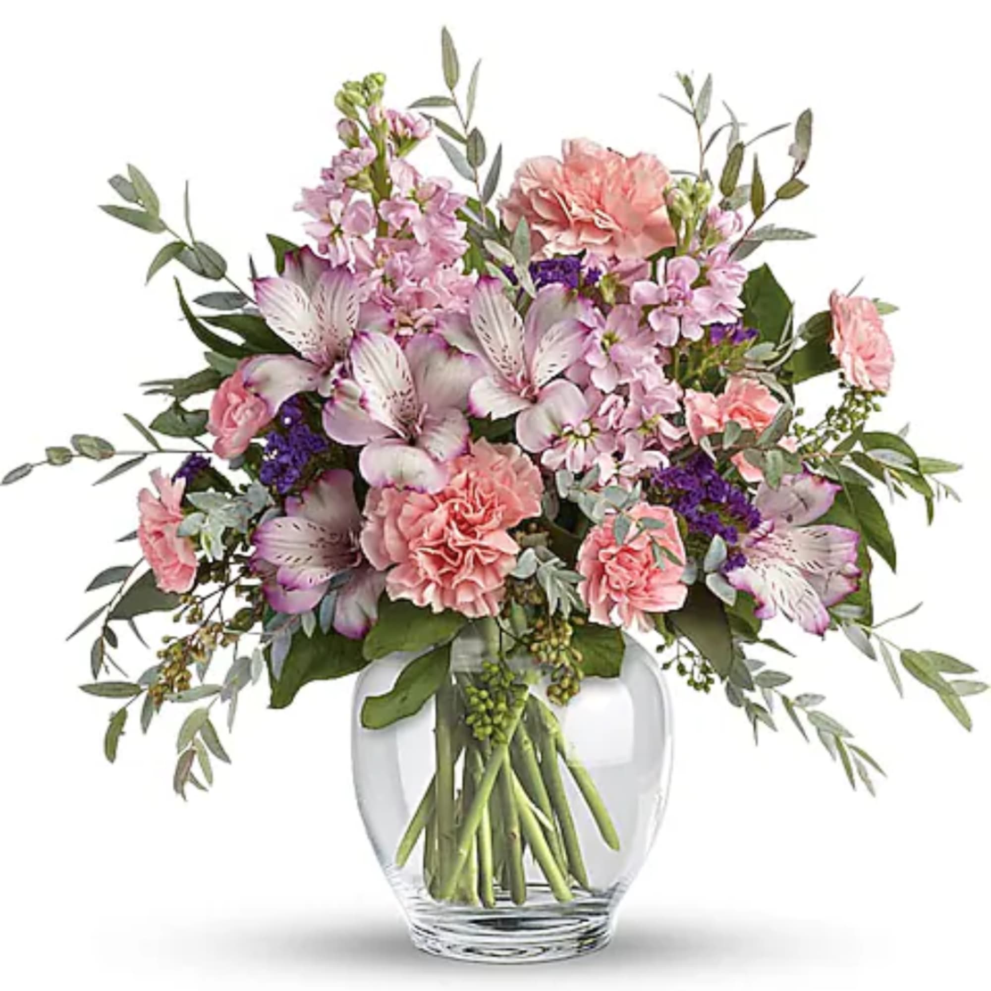Pink and lavender mixed bouquet in a clear glass vase