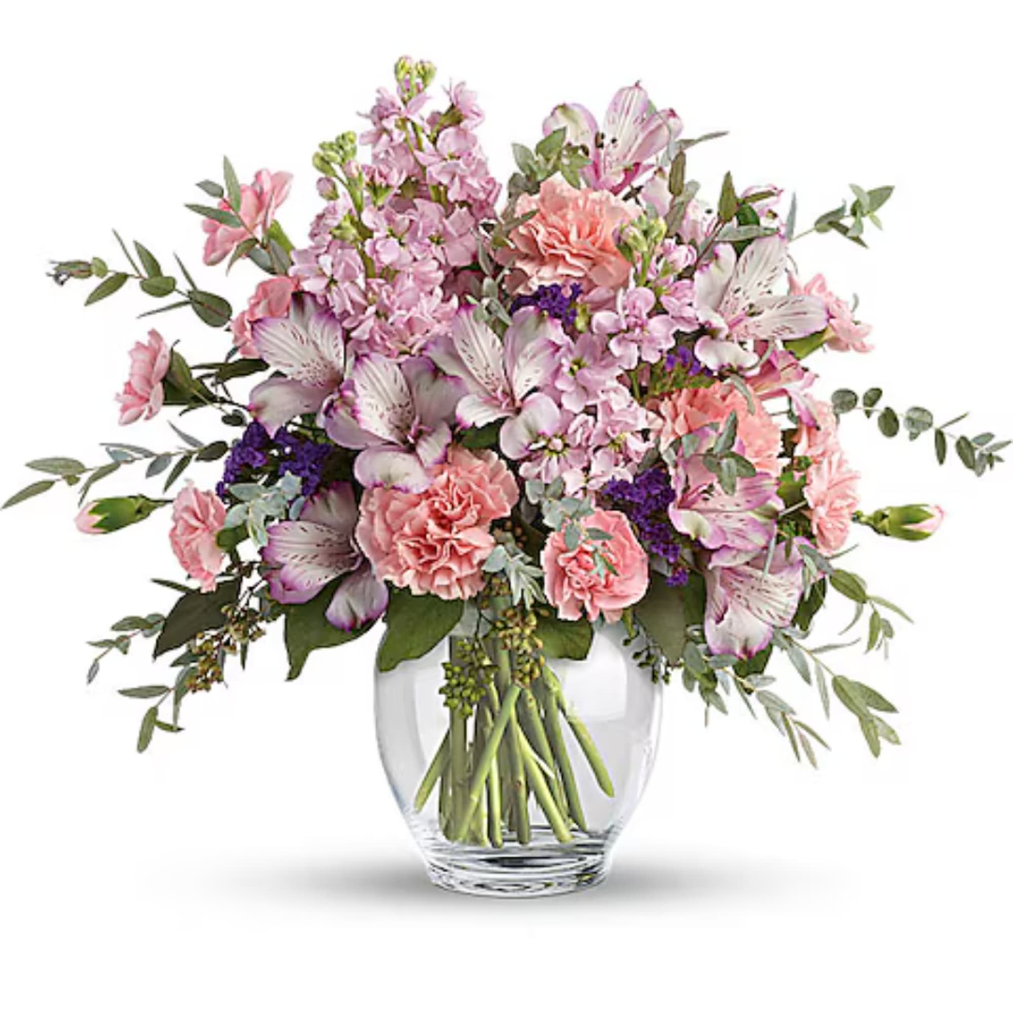 Pink and lavender mixed bouquet in a clear glass vase