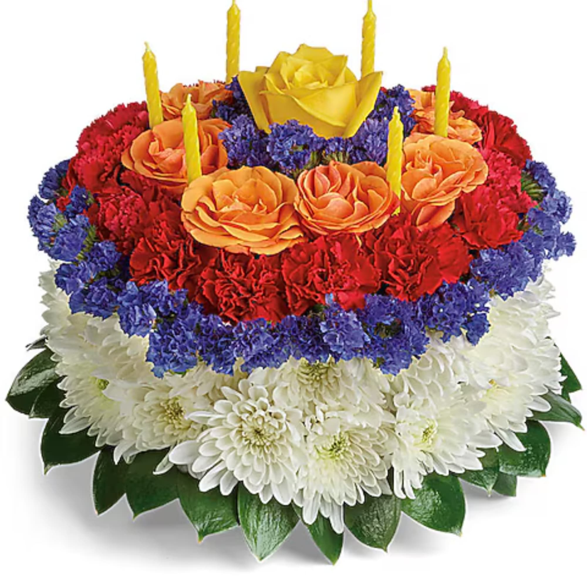 Round floral cake with candles in red, orange, yellow, blue, and white