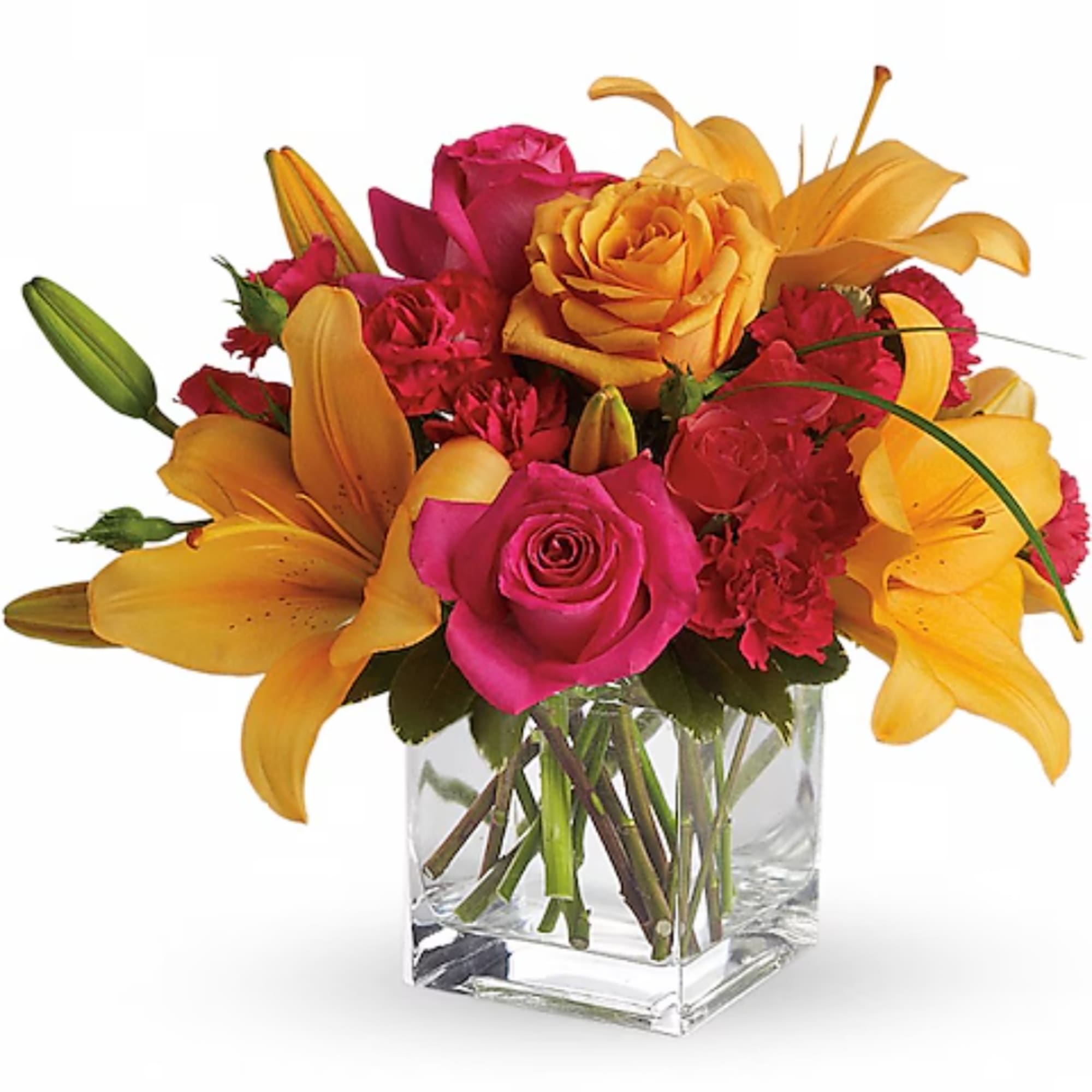 Pink roses and yellow lilies arranged in a clear glass vase