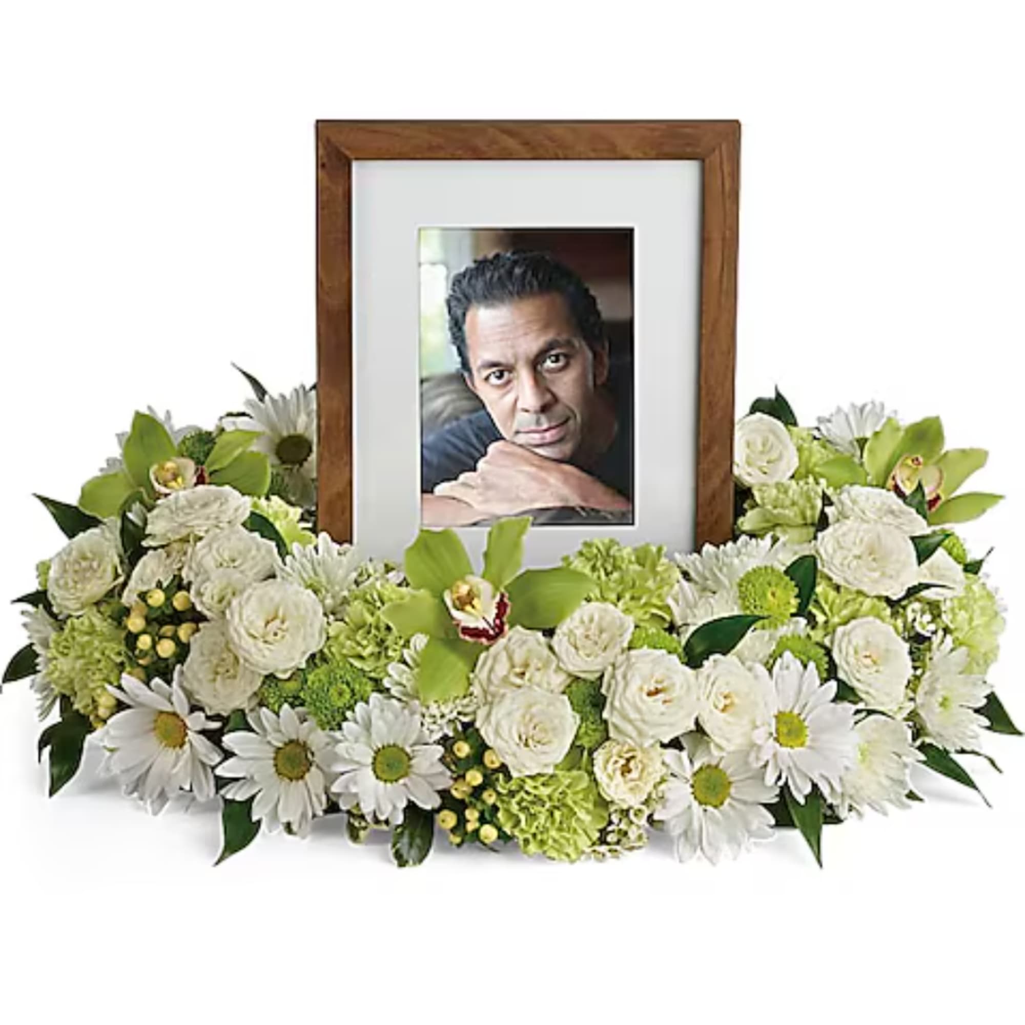 Framed photo surrounded by white and green flowers