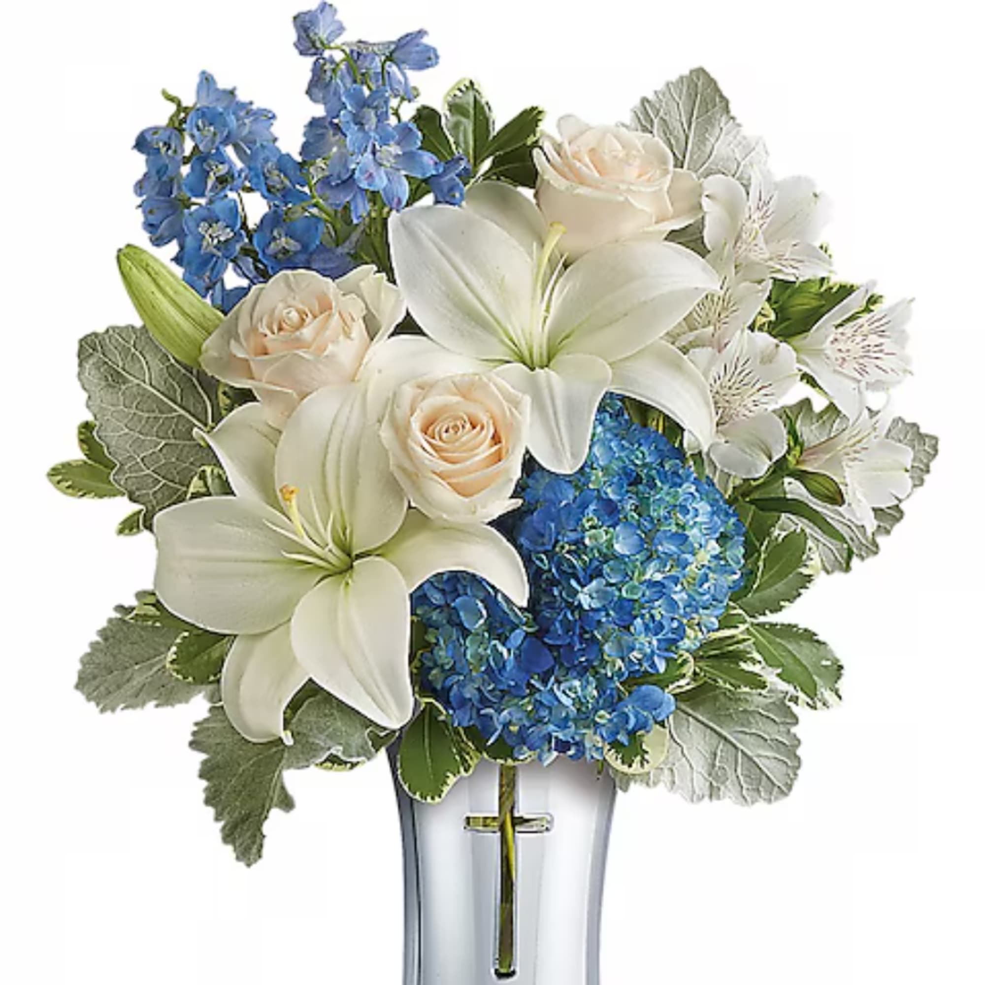Blue and white floral arrangement in a clear vase with roses and lilies