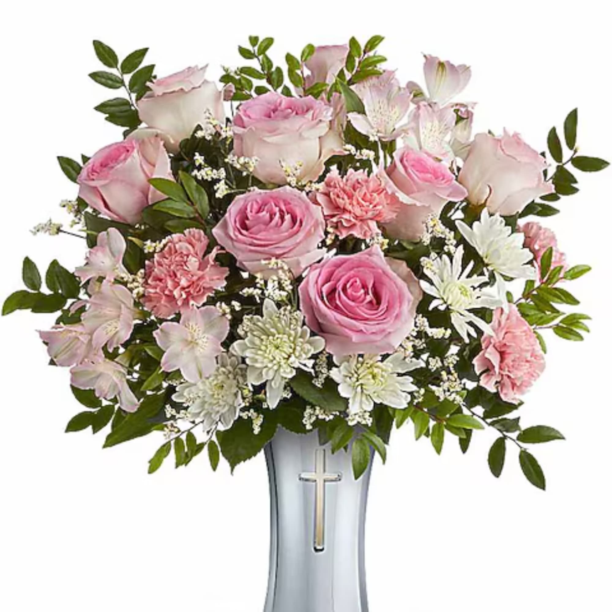Pink roses and white flowers arranged in a silver vase with a cross