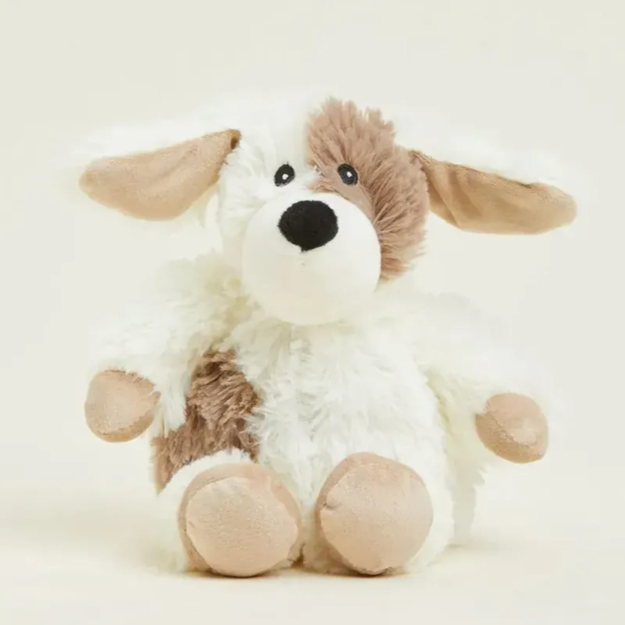 Plush dog toy with floppy ears and tan paws