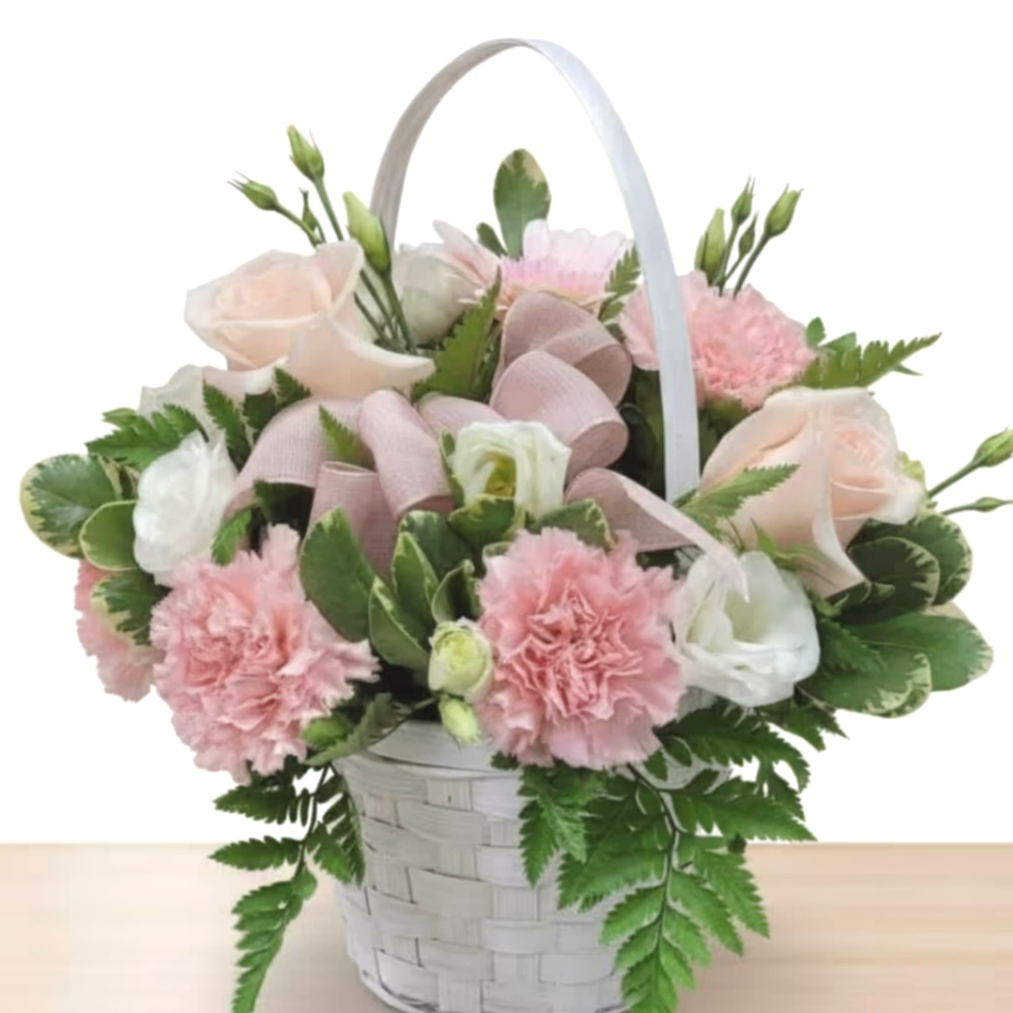 Pink and white flowers arranged in a white basket with a ribbon handle, photo 2 of 2