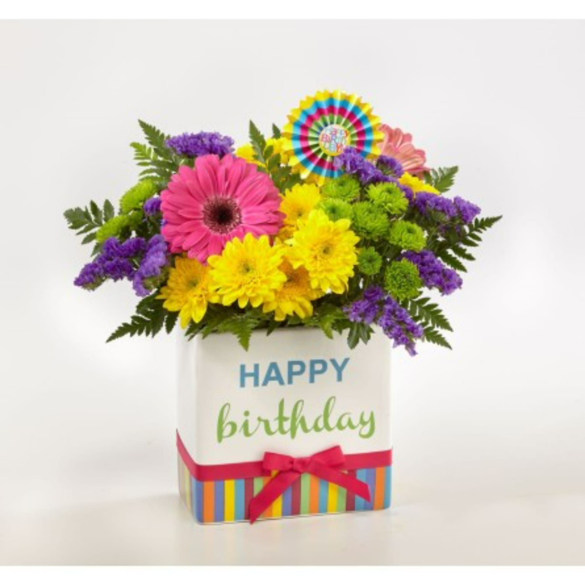 Birthday flower arrangement in a decorated box with a ribbon