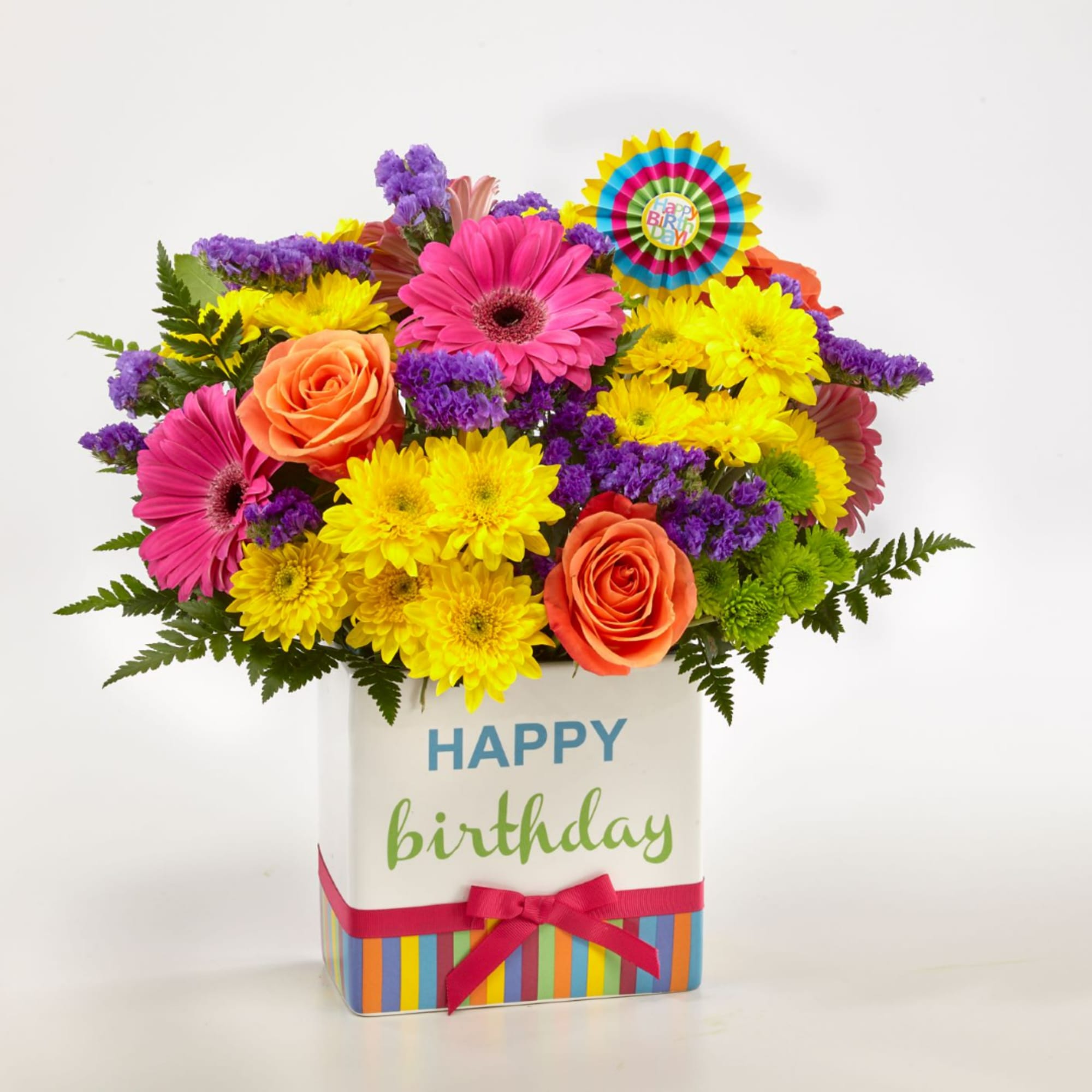 Bright mixed bouquet in a birthday gift box with roses and daisies