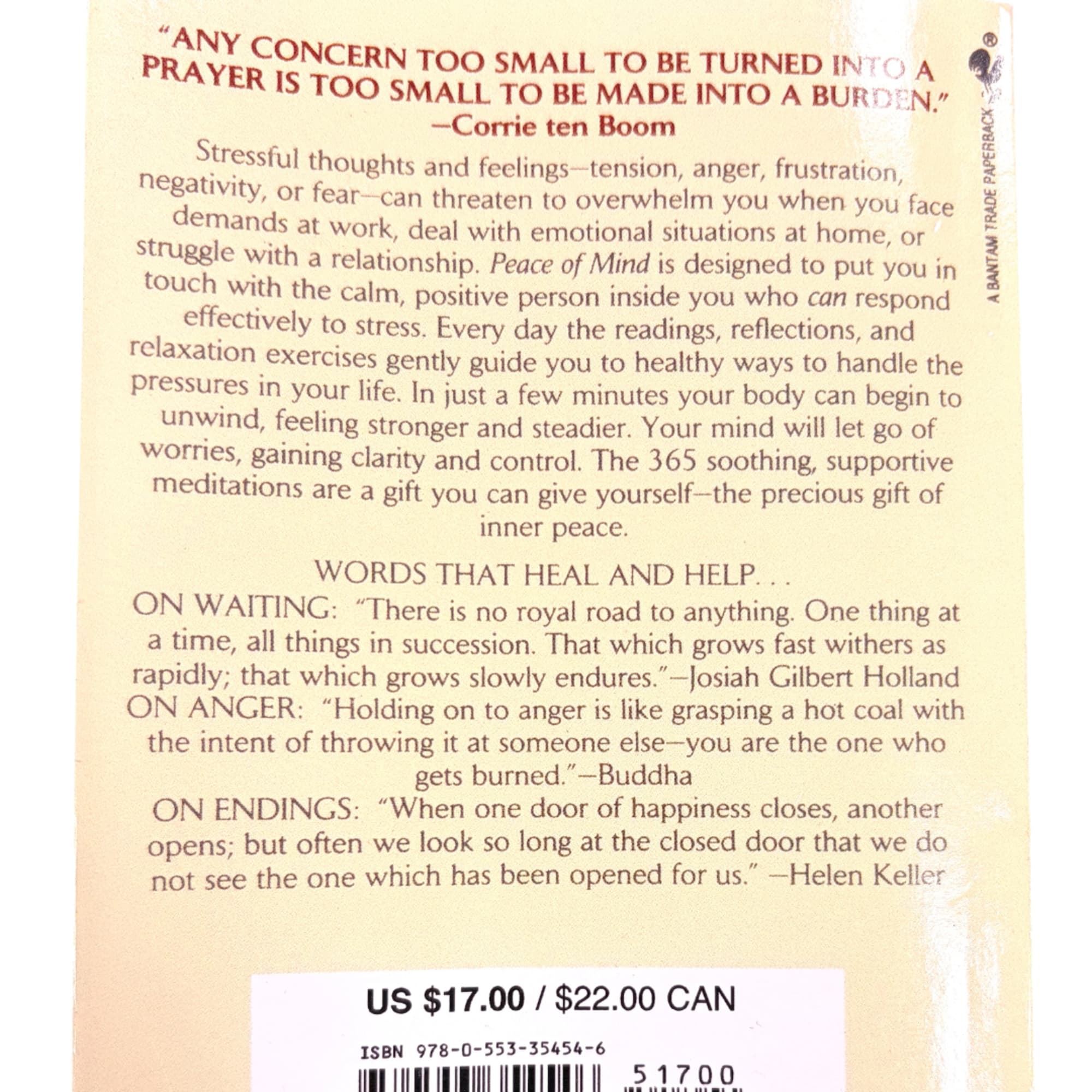 Back cover of a book with printed text and a price sticker