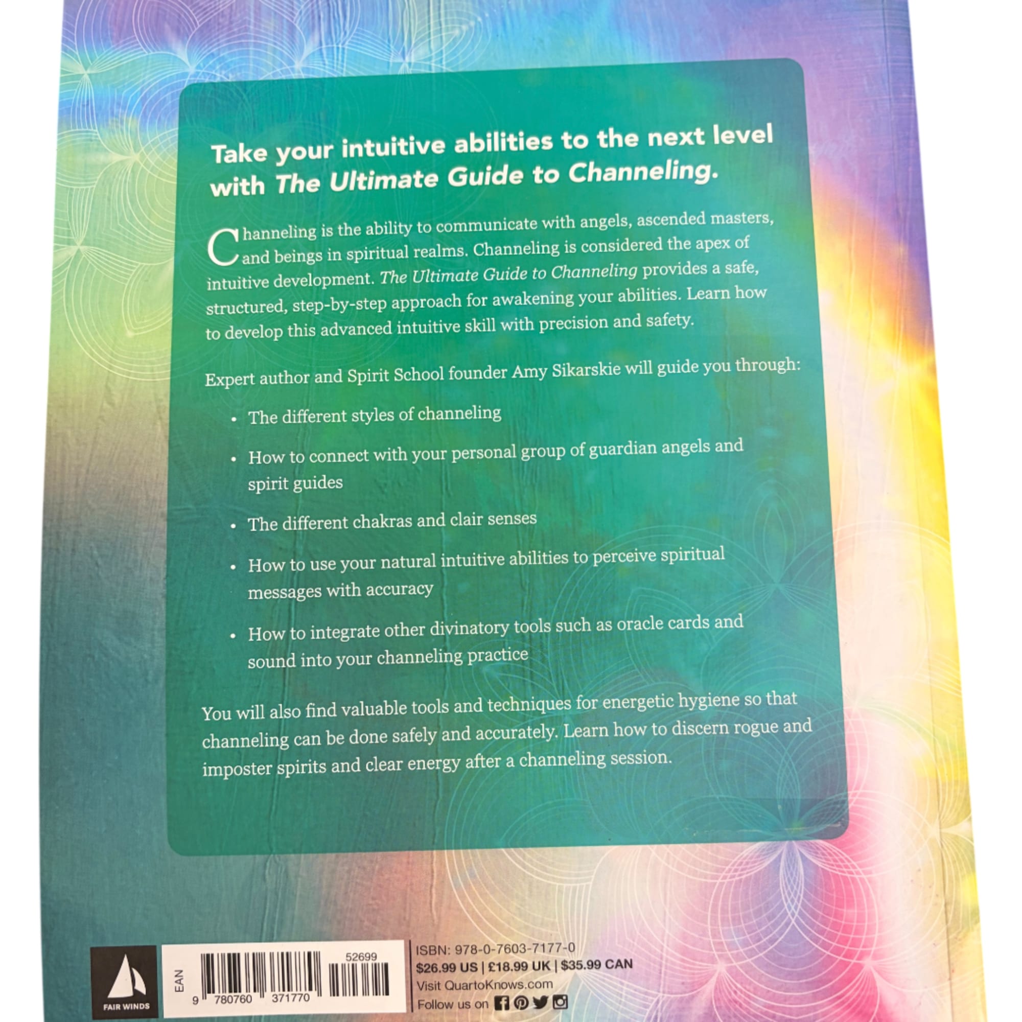 Back cover of a book with a colorful abstract background and text panel