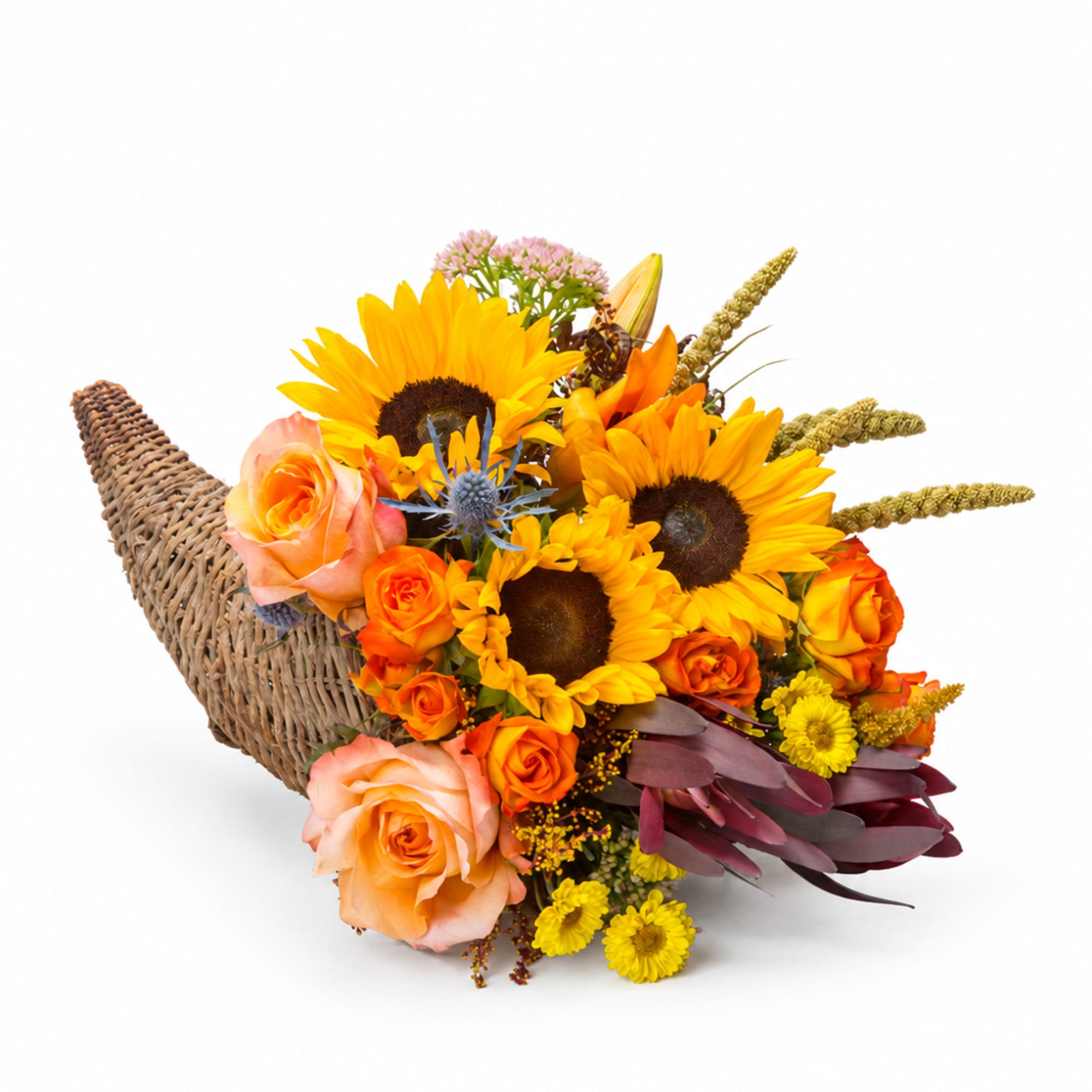 Basket arrangement with sunflowers, orange roses, and yellow daisies