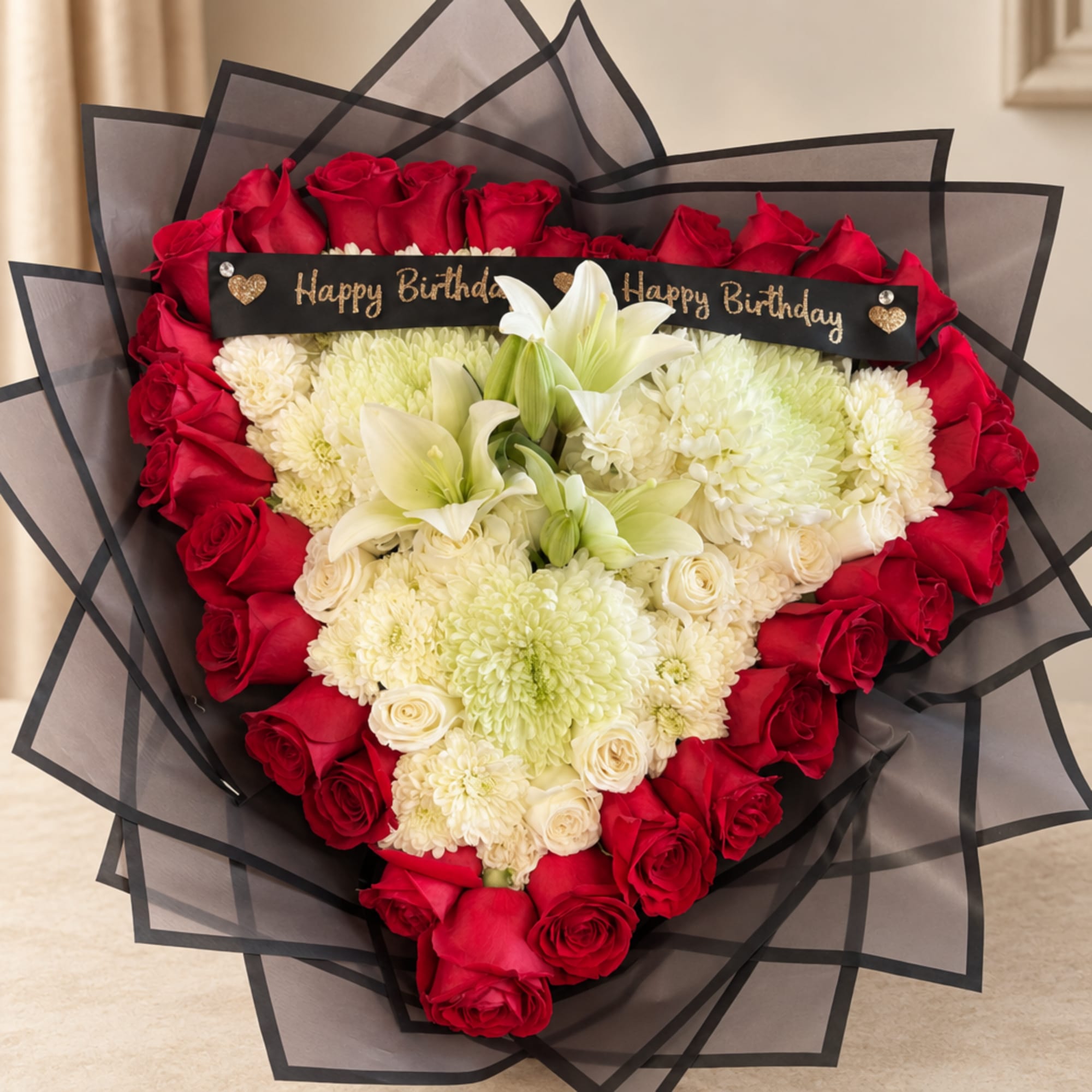 Heart-shaped bouquet of red roses and white flowers with a Happy Birthday sign