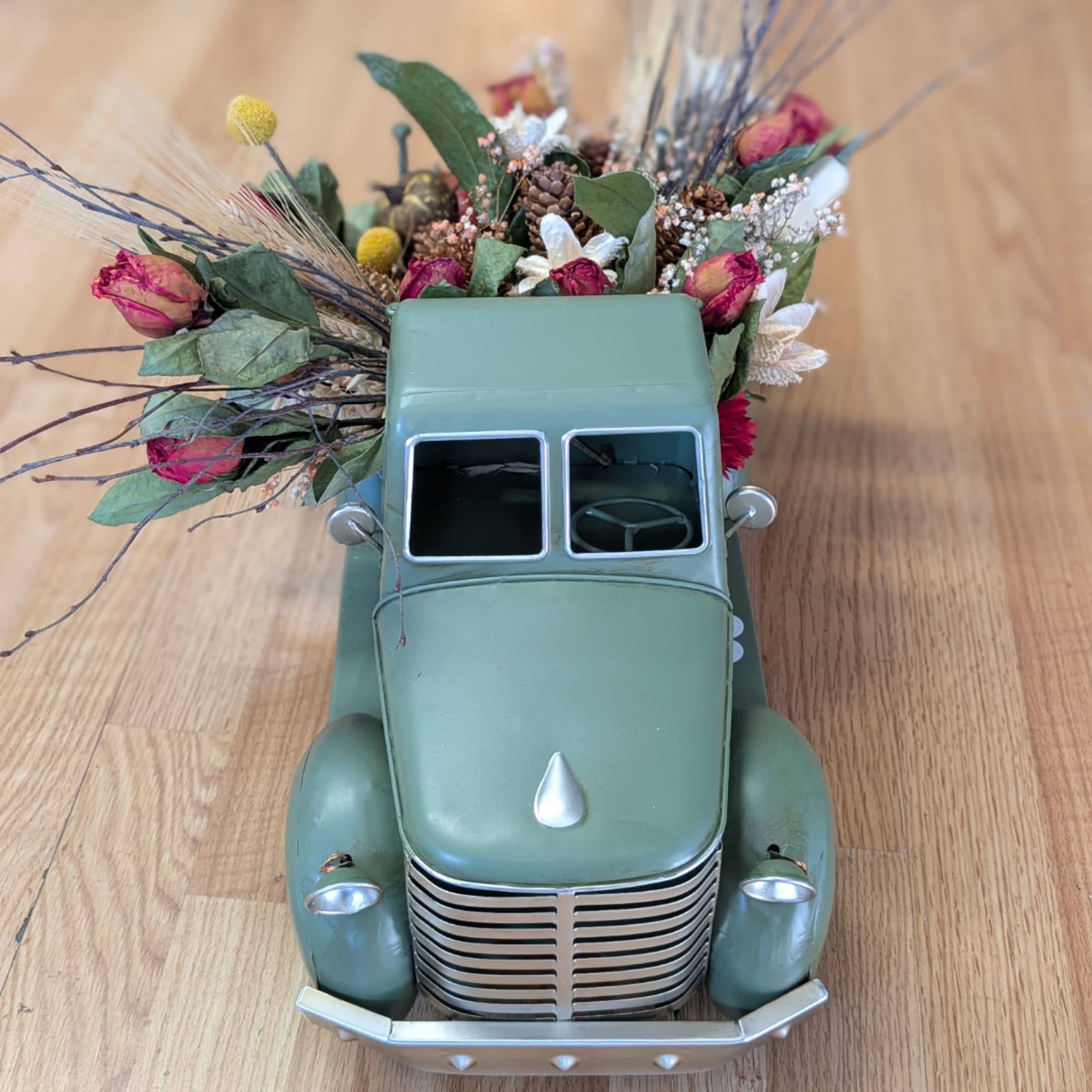 Vintage truck filled with dried flowers and grasses