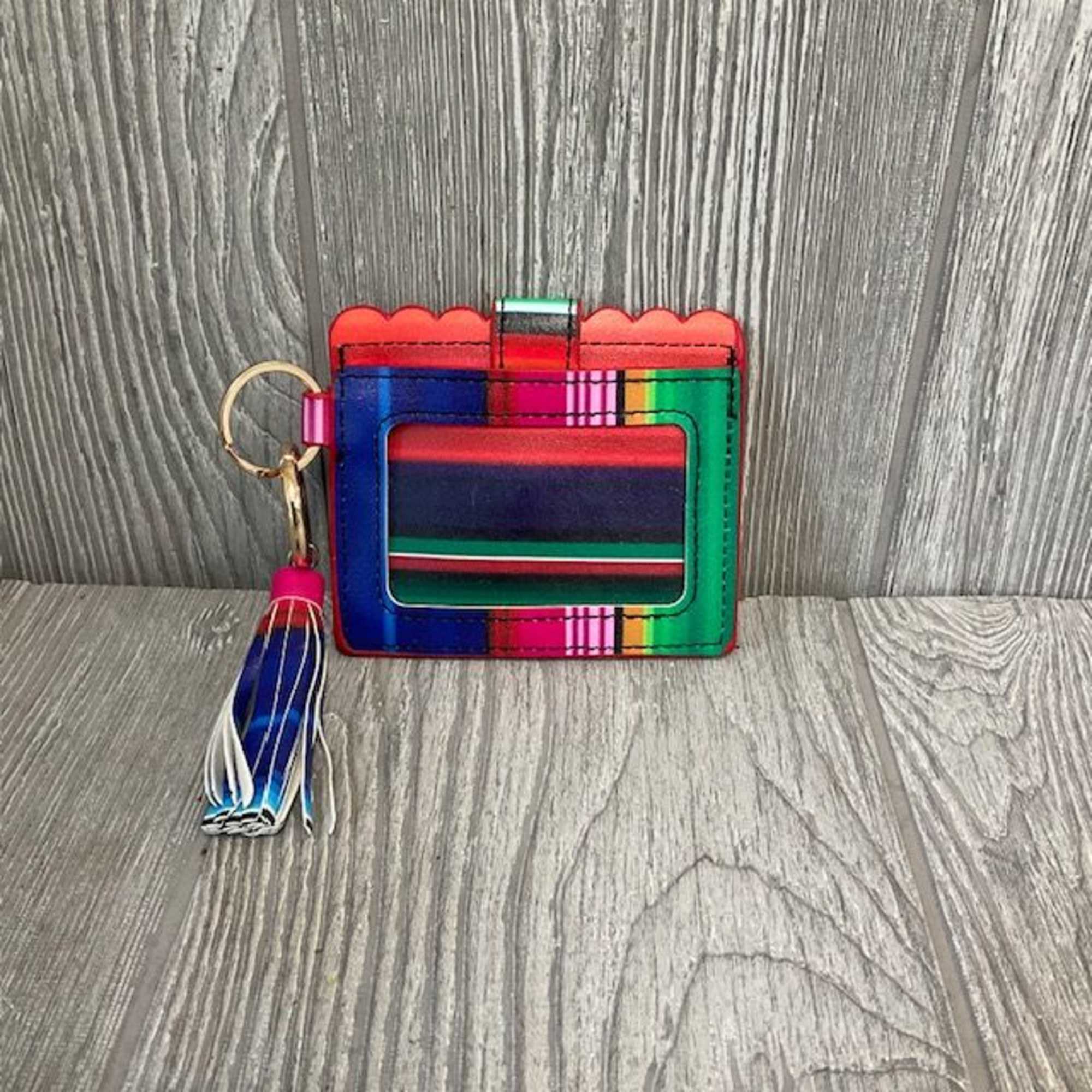 Colorful striped card holder with a tassel keychain