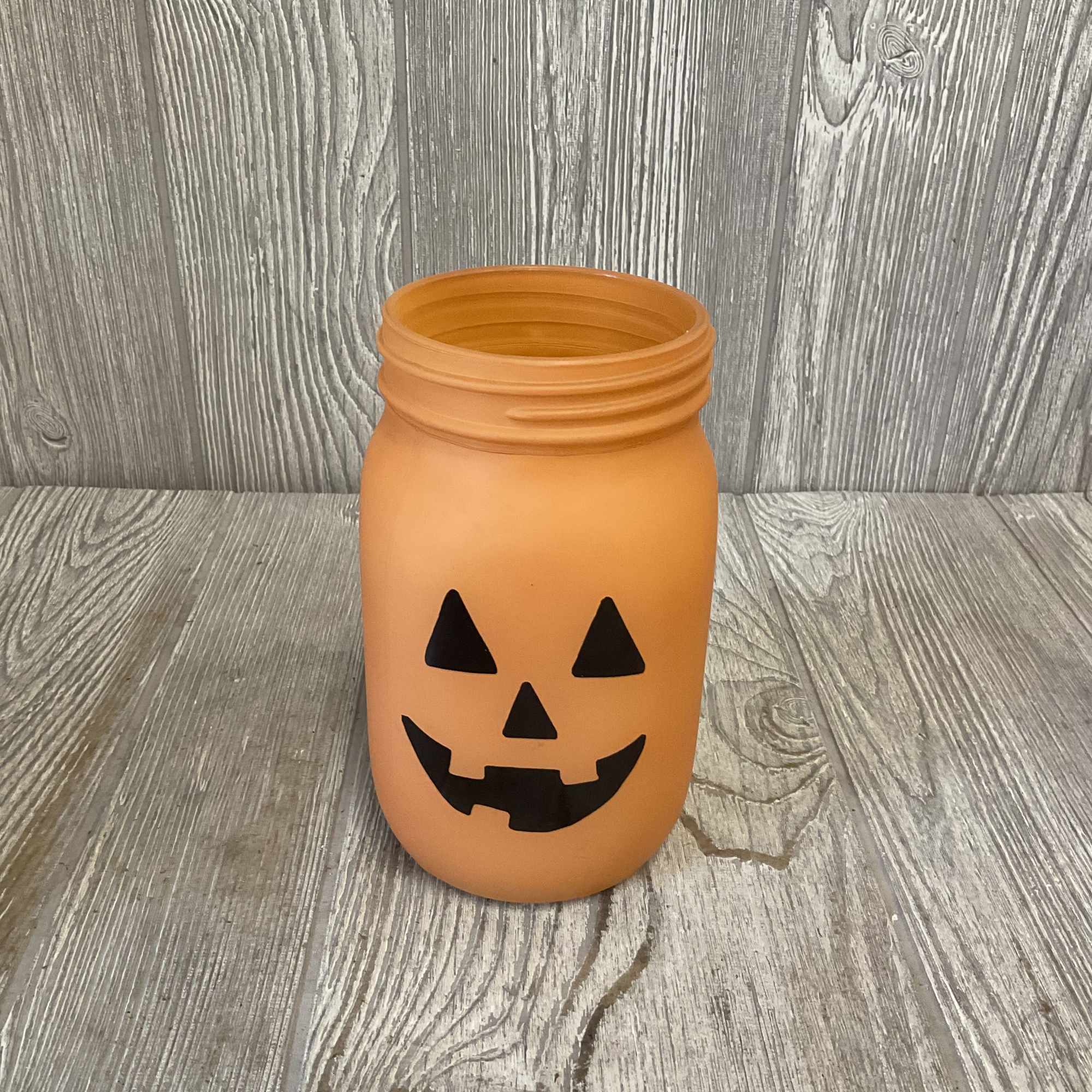 Arranged in a keepsake Jack-o&rsquo;-Lantern glass jar with spooky Halloween inclusions. Unique, photo 2 of 2