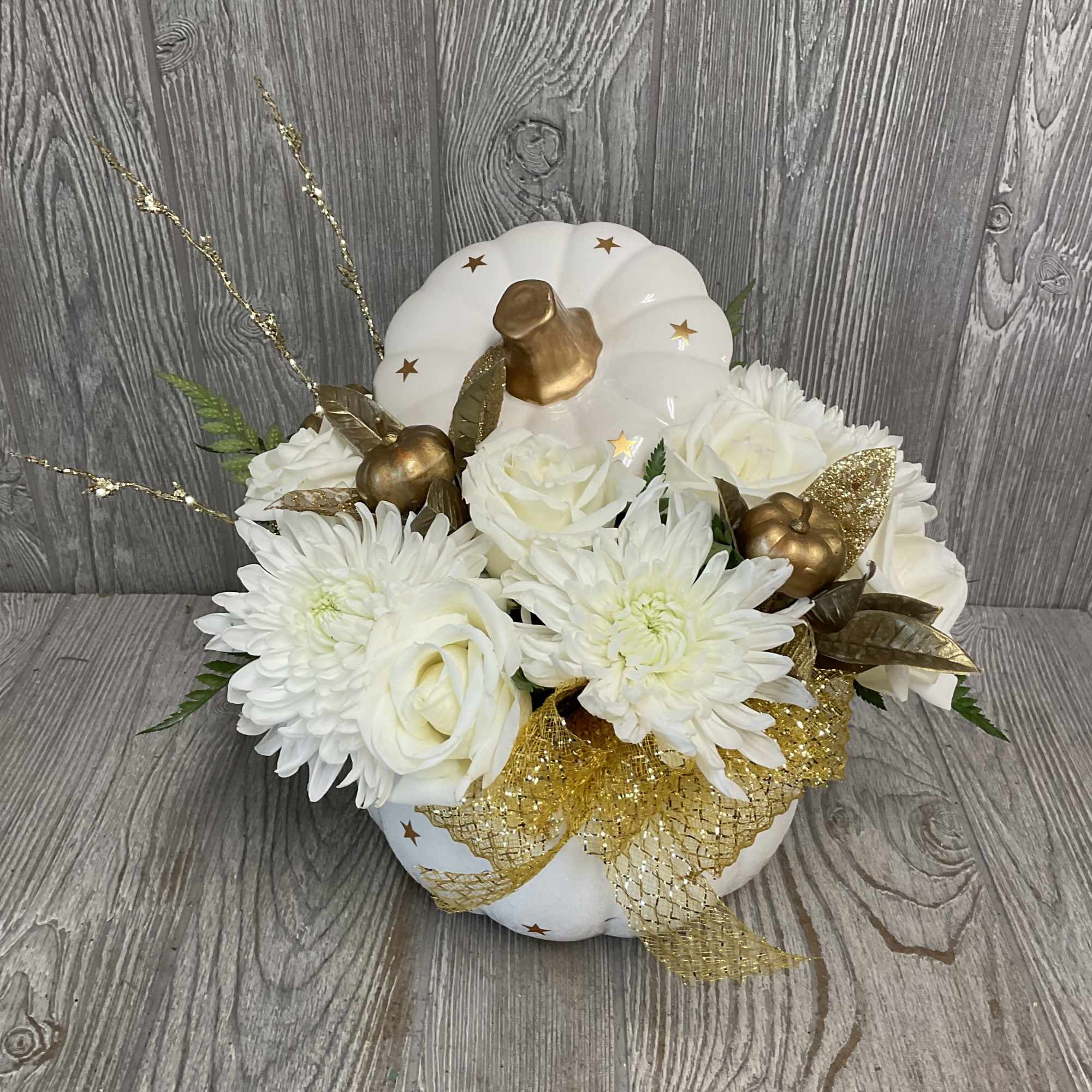 A beautiful arrangement of fresh cut flowers in a keepsake ceramic white, photo 2 of 3