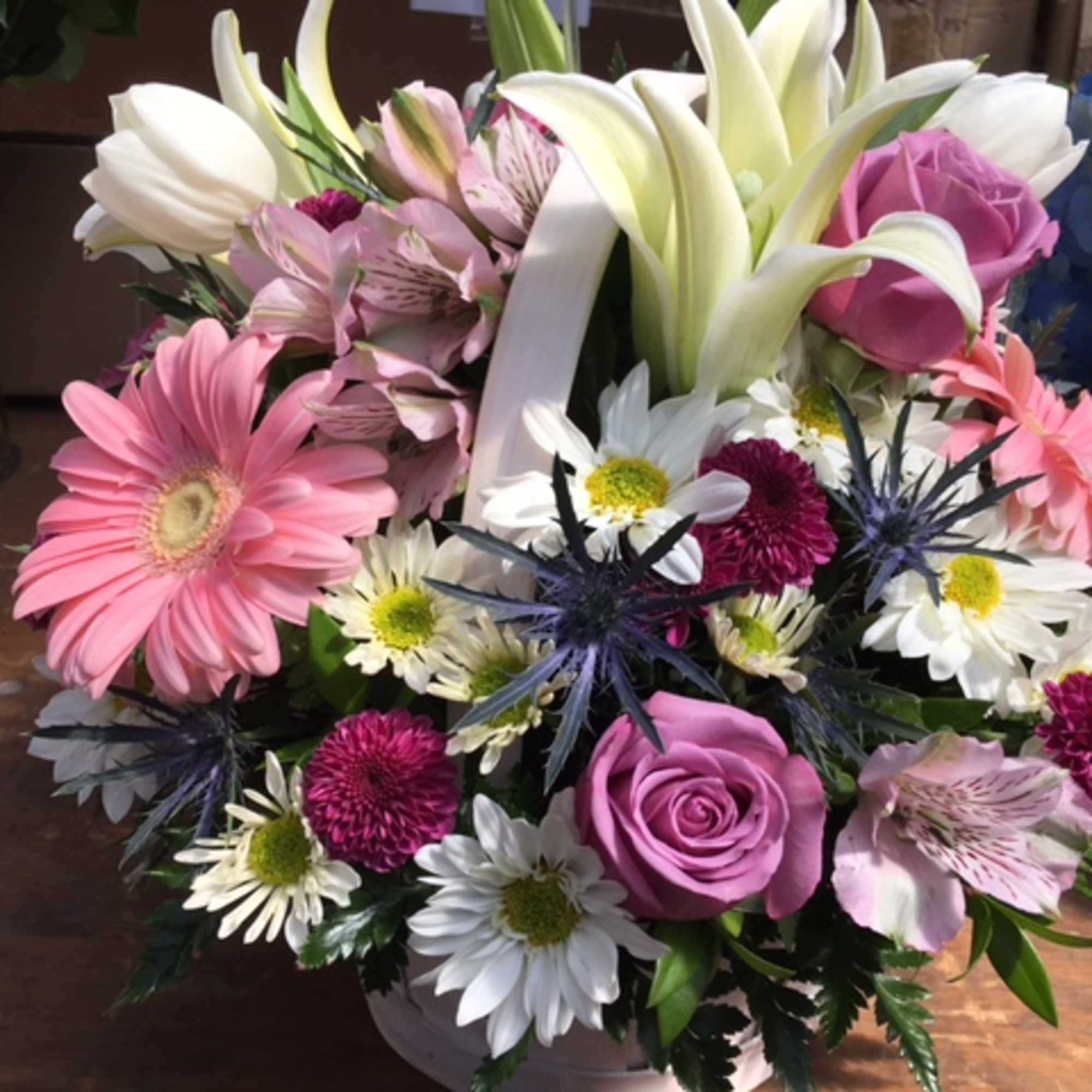 A stunning display of beautiful fresh blooms hand-crafted and designed in a