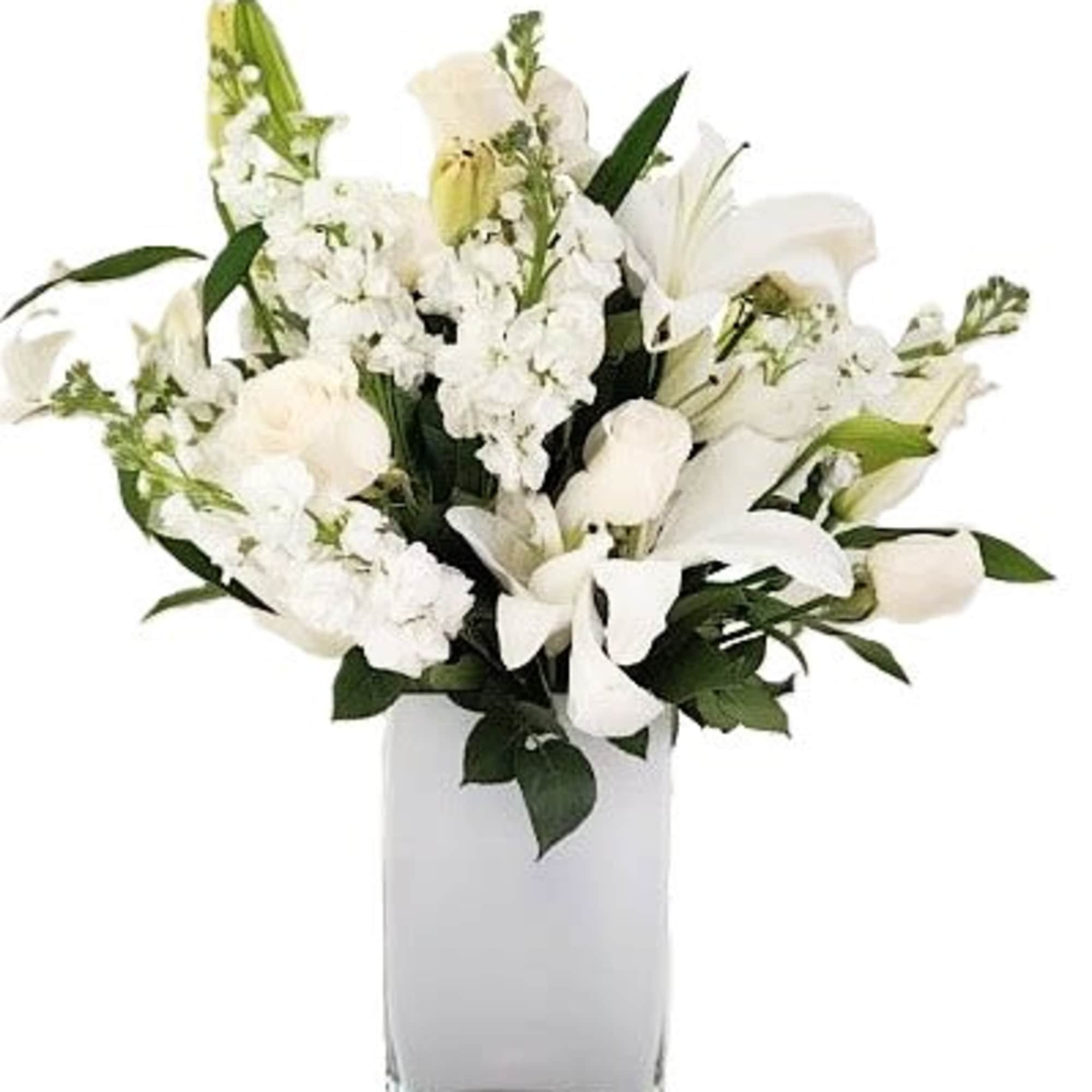 An all white combination of lilies, roses and snapdragons.