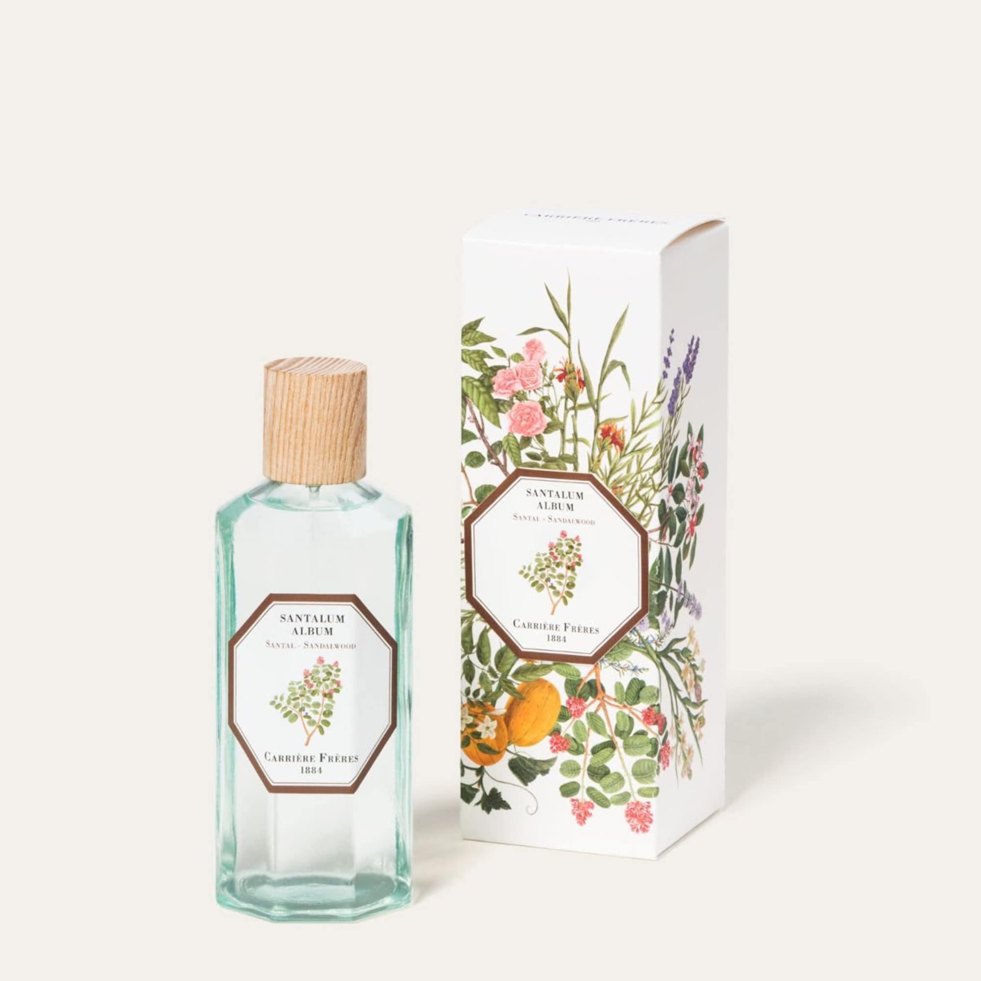 Perfume bottle with a floral-patterned box