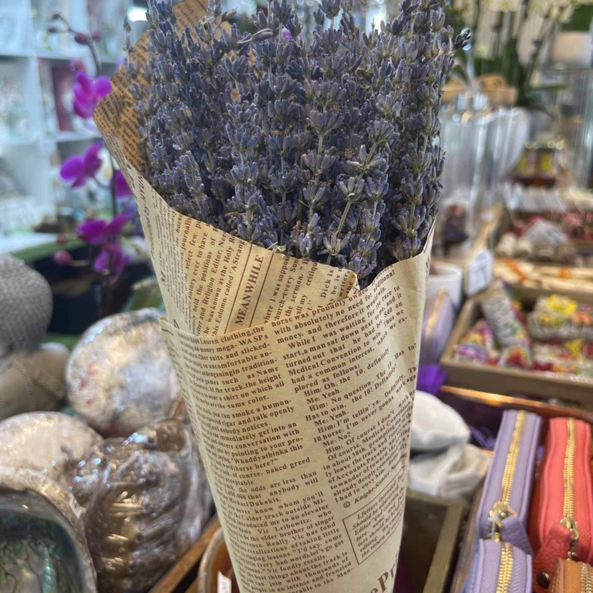 Bouquet of purple lavender wrapped in printed paper