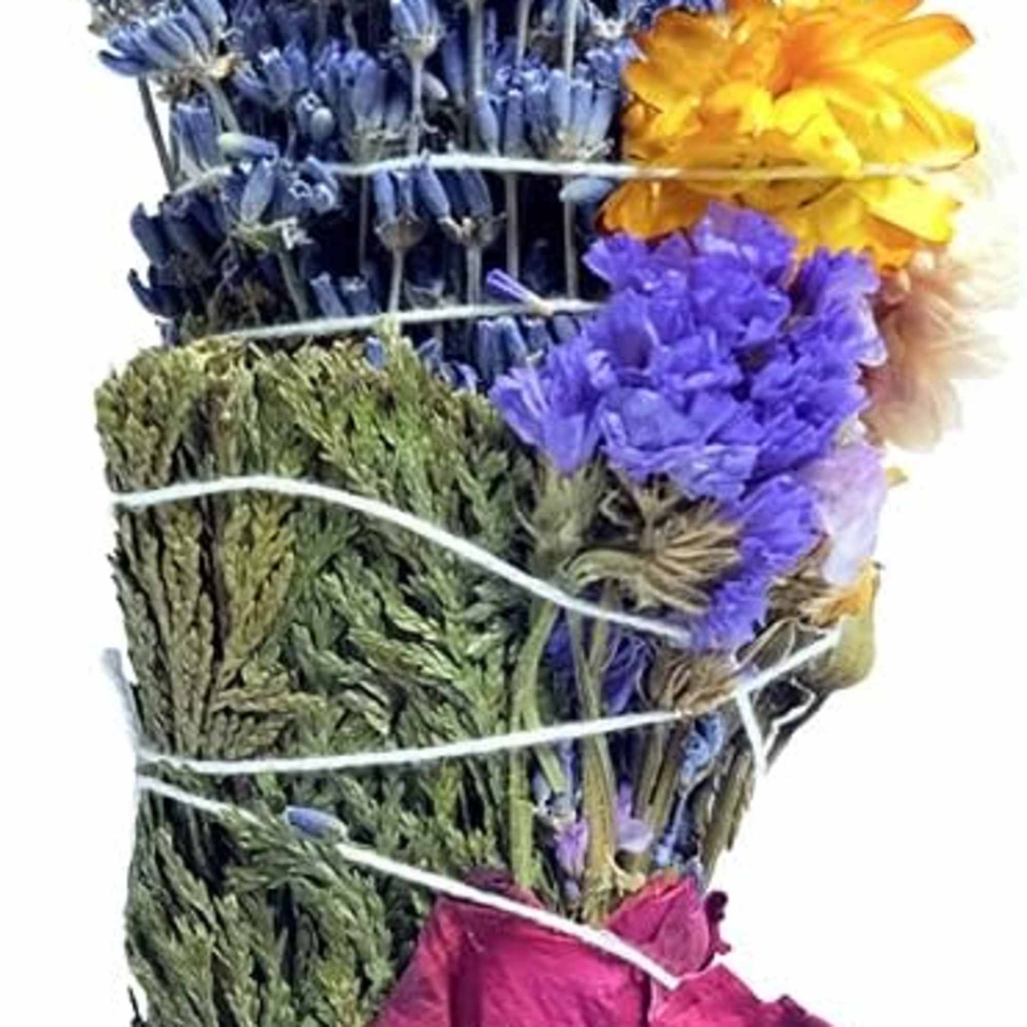 Bundle of dried blue, yellow, purple, and pink flowers tied with white string