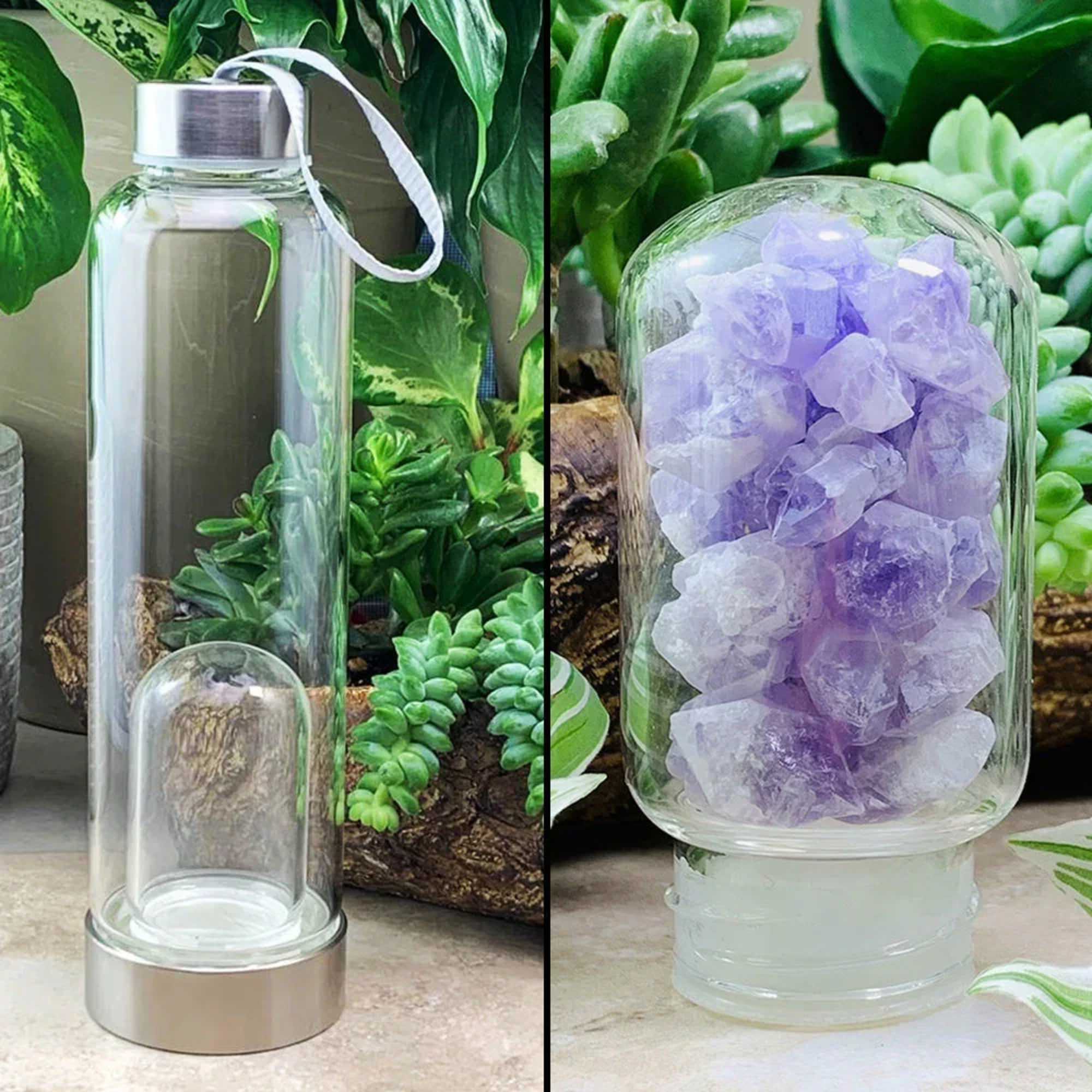 Clear glass bottle with a silver cap and ribbon beside a glass jar of purple crystals