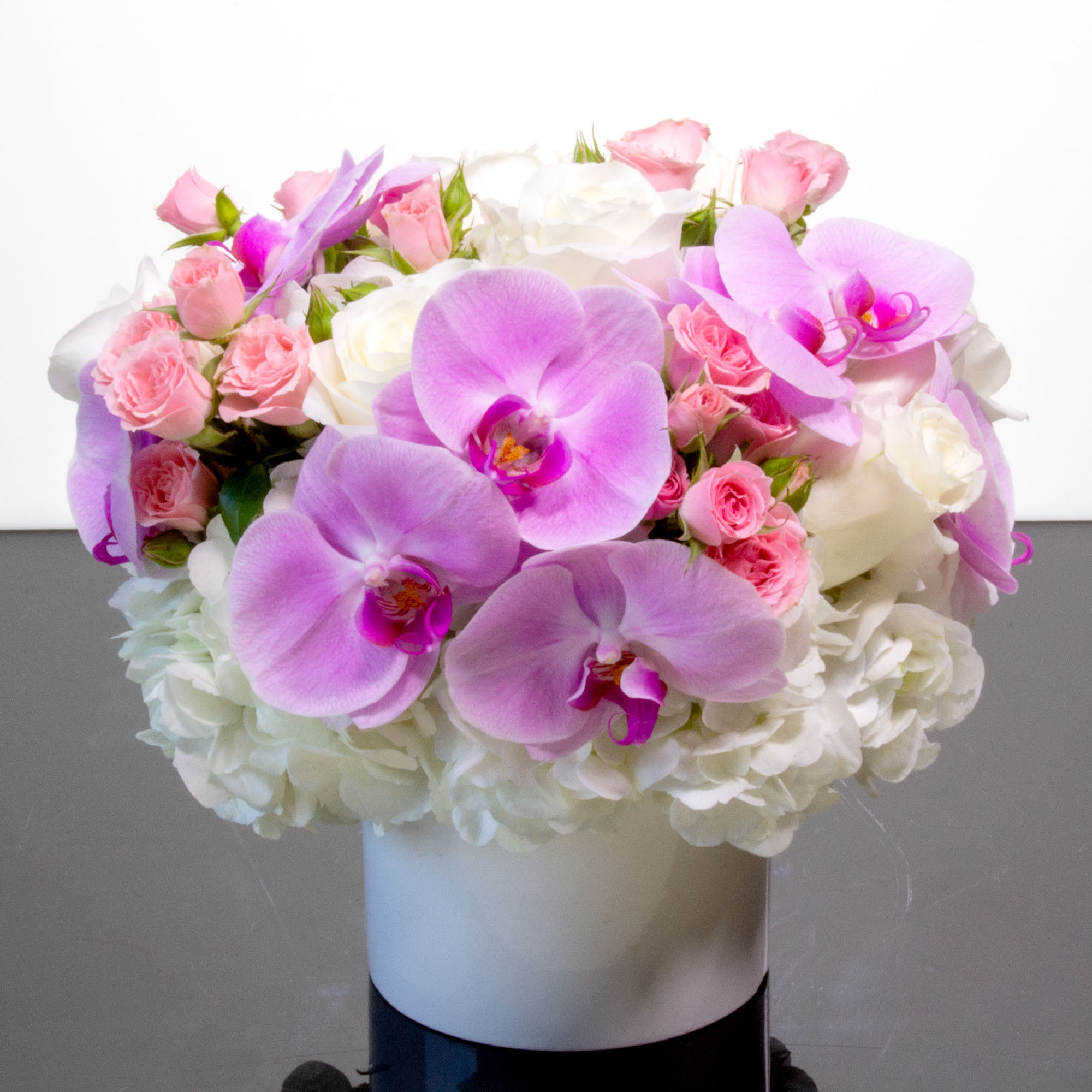 Uniquely designed to create a memorable impression, this spectacular arrangement of beautiful