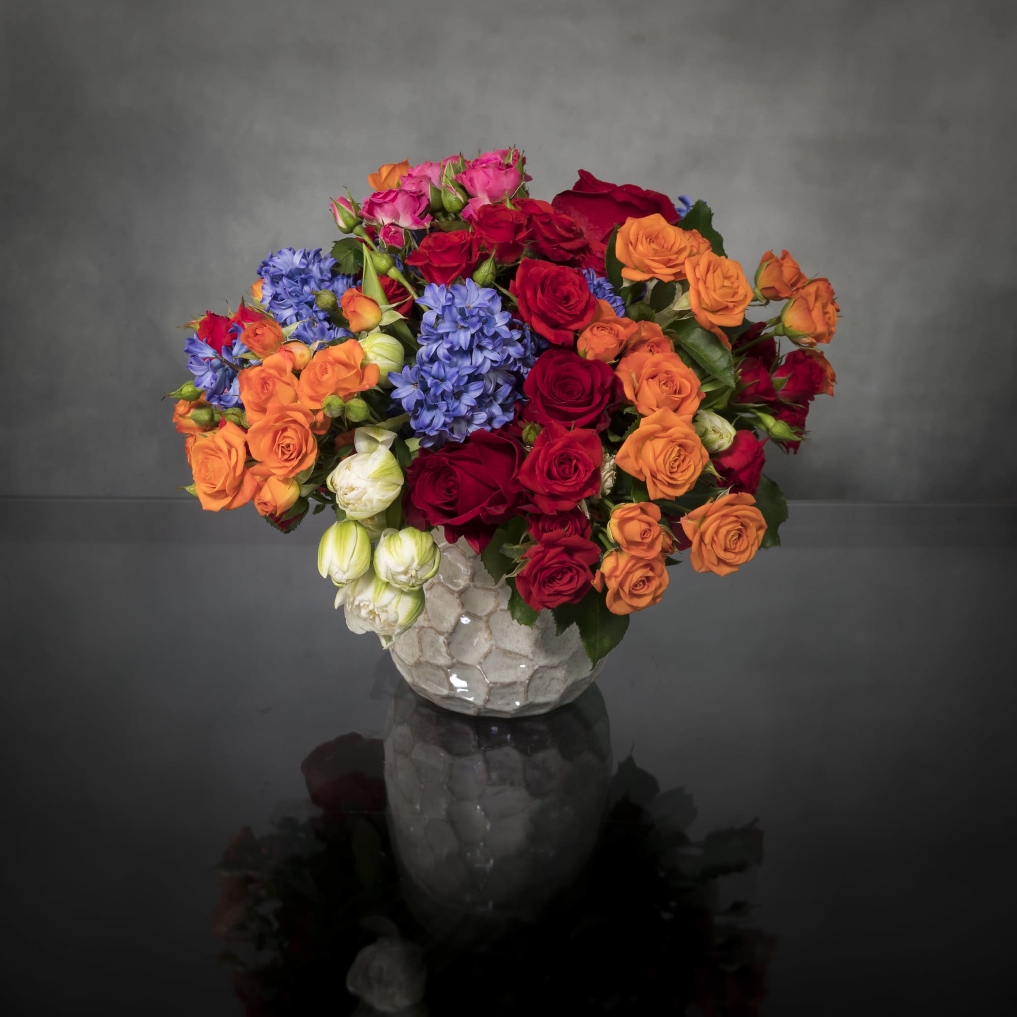 Let one of our talented designers put together a beautiful summer arrangement