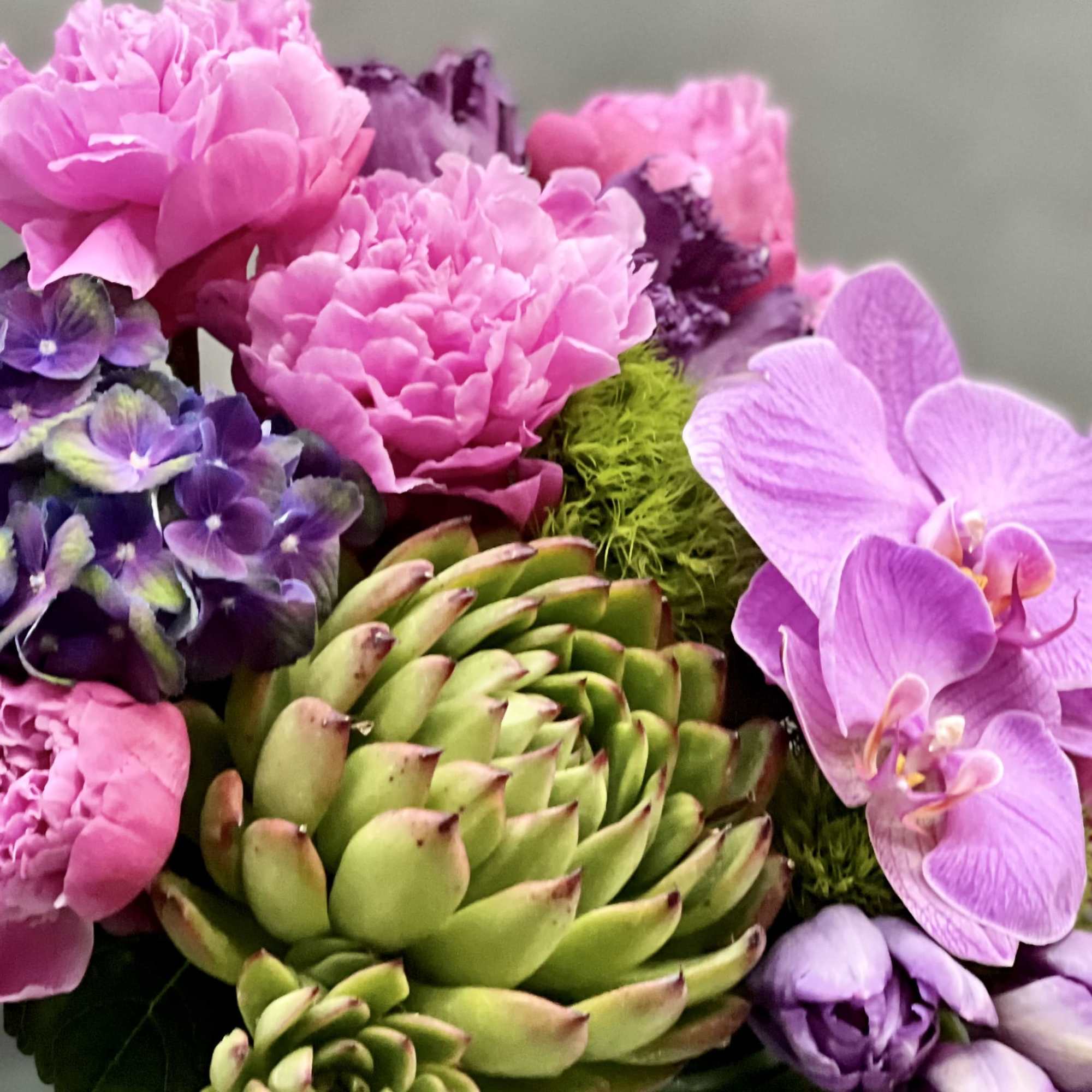 This striking floral arrangement designed by one of our talented designers consists, photo 4 of 4