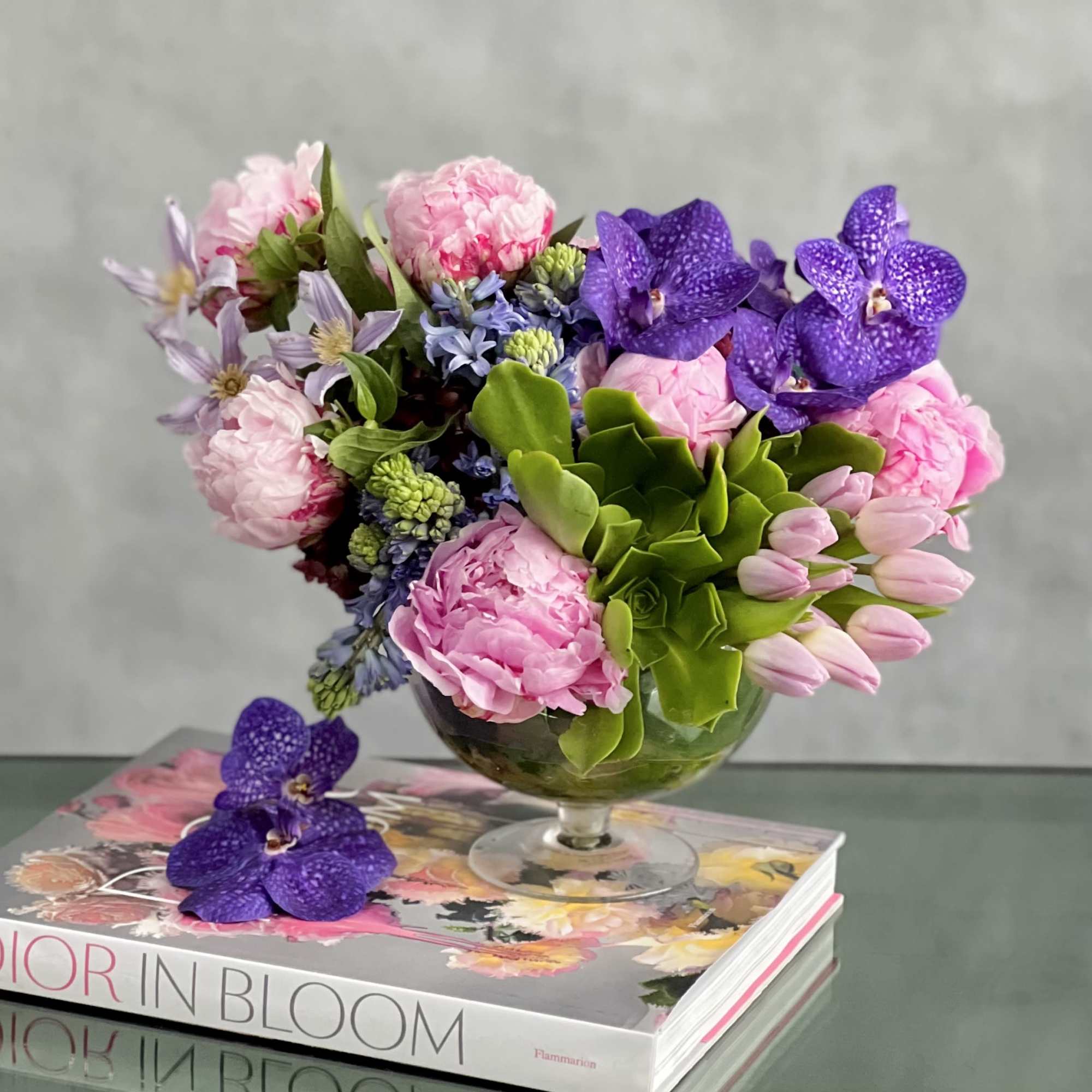 Experience a touch of luxury with our exclusive floral arrangement crafted by