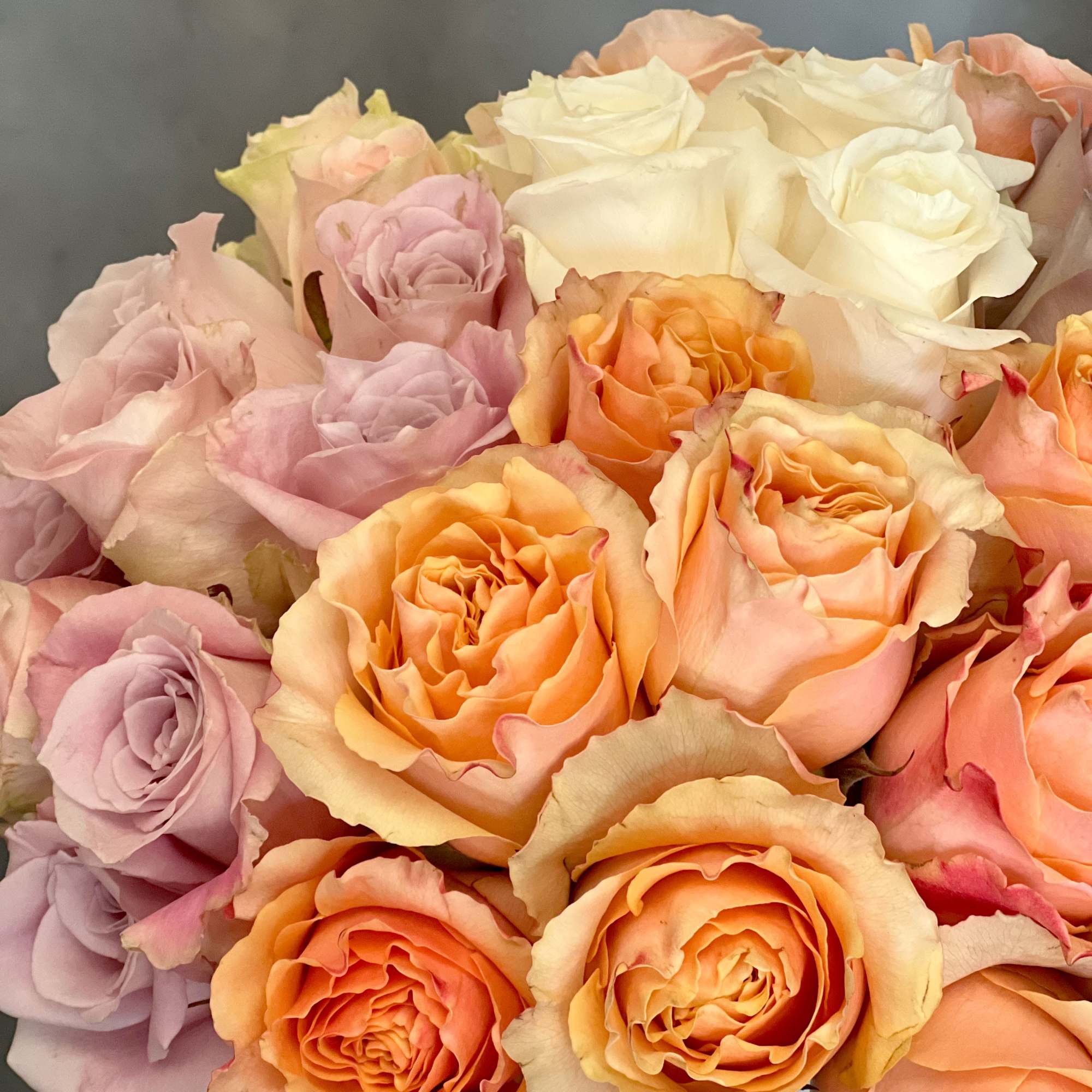 A sensational floral presentation arranged in a white vase. Luscious pastels featuring, photo 3 of 3