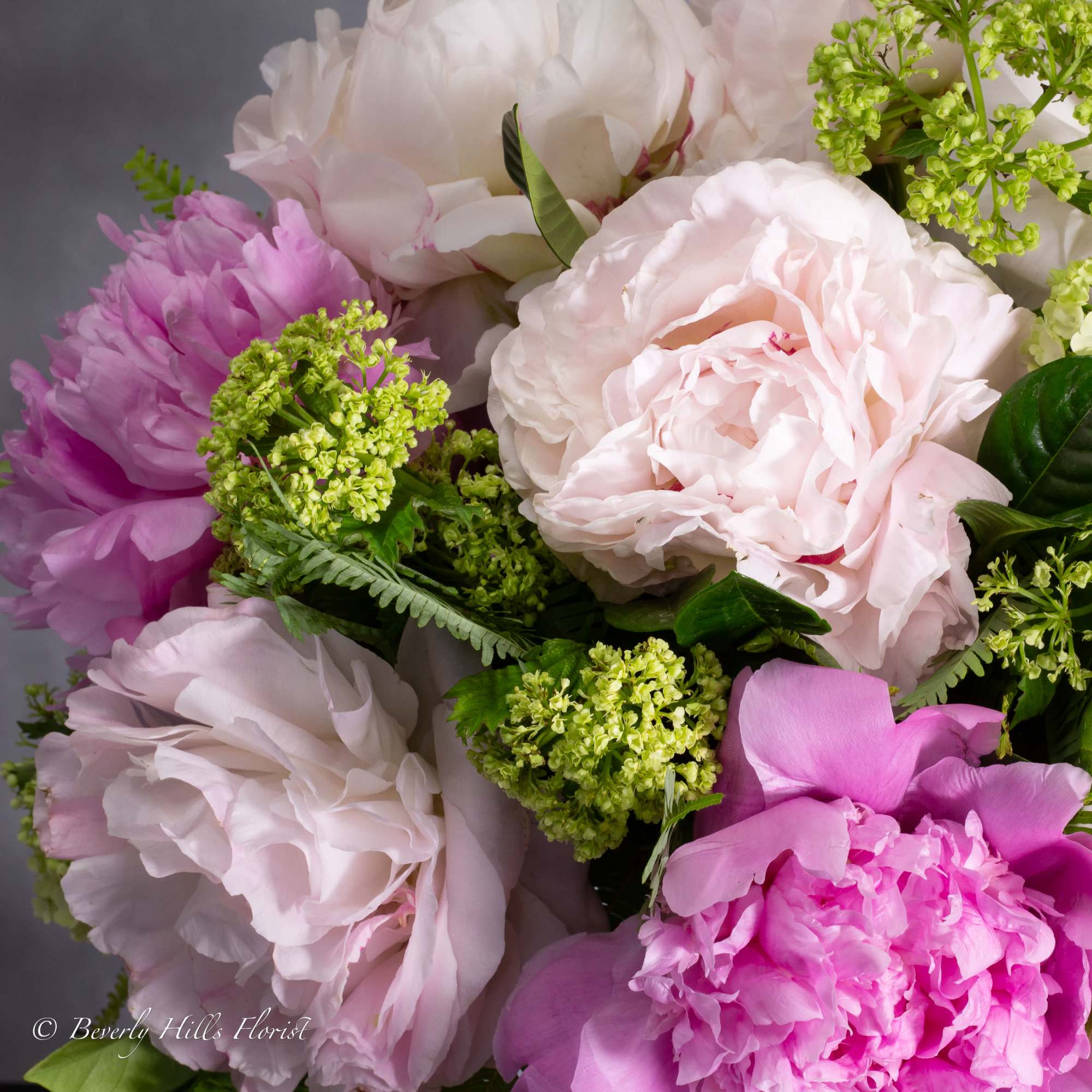 Available for Same-Day Delivery!

Nestled within a sleek vase, the Ethereal Elegance arrangement, photo 4 of 4