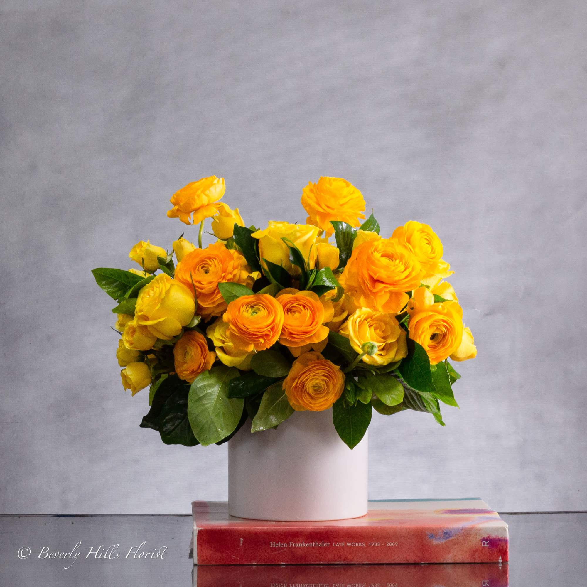 Brighten someone's day with our Sunshine Serenade Bouquet, featuring a stunning blend