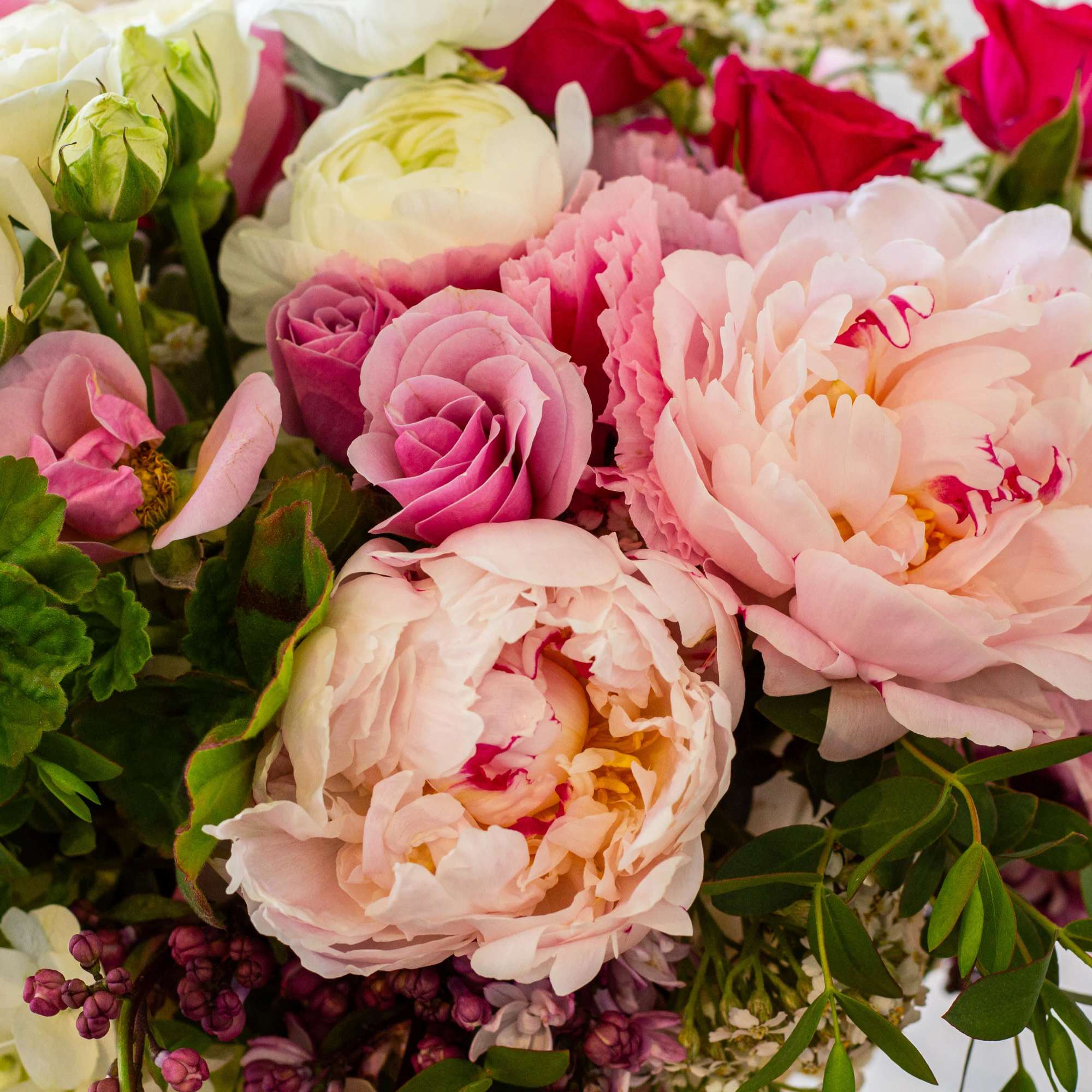 For this exquisite floral arrangement, envision a captivating blend of peonies, lilacs, photo 4 of 5