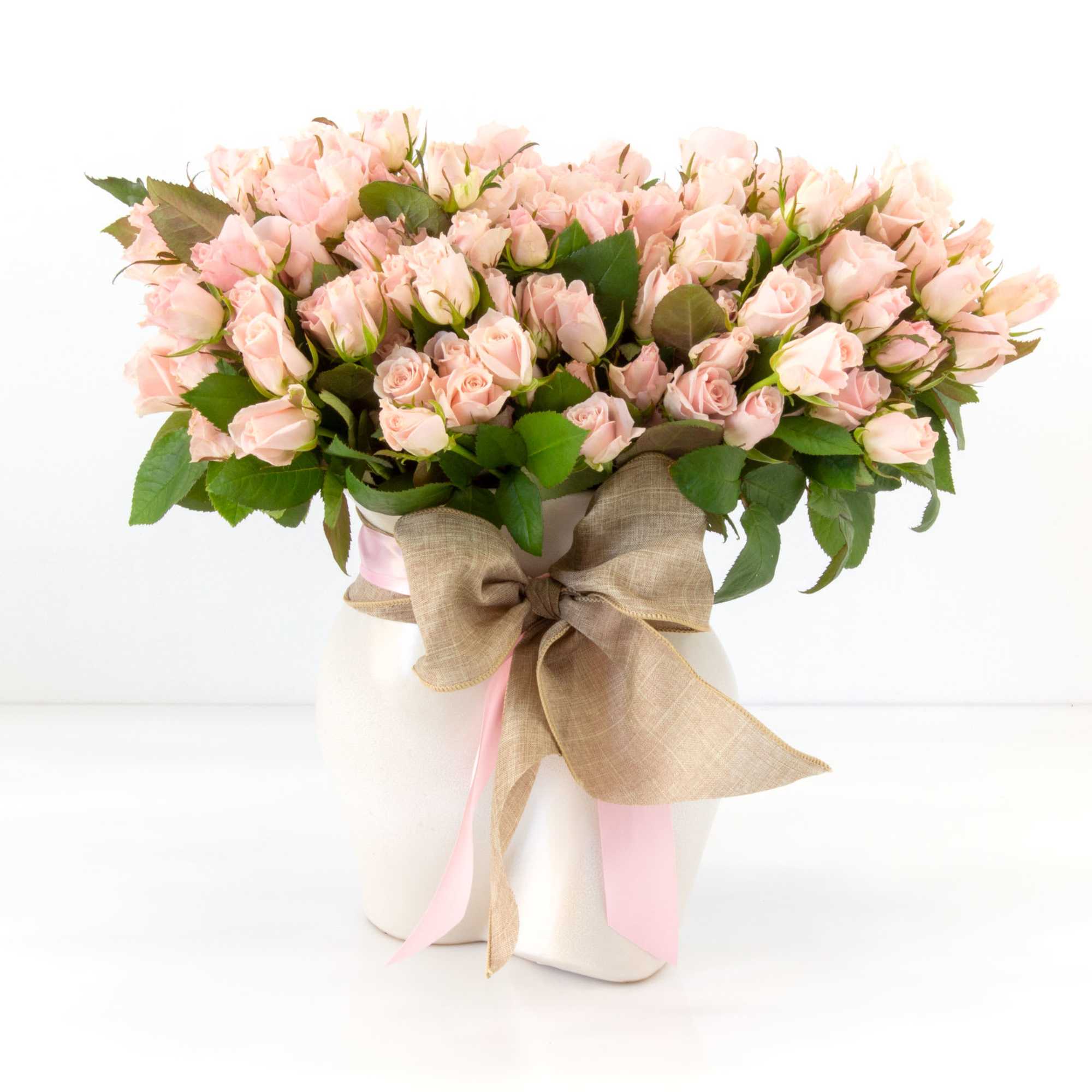 approx. 22" tall and 28" wide sweet and spray roses