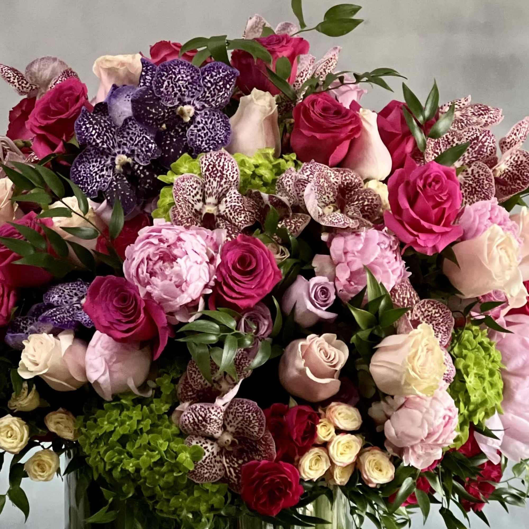 Pastels and vivid bright florals are featured in this sophisticated design. Lovely, photo 3 of 4