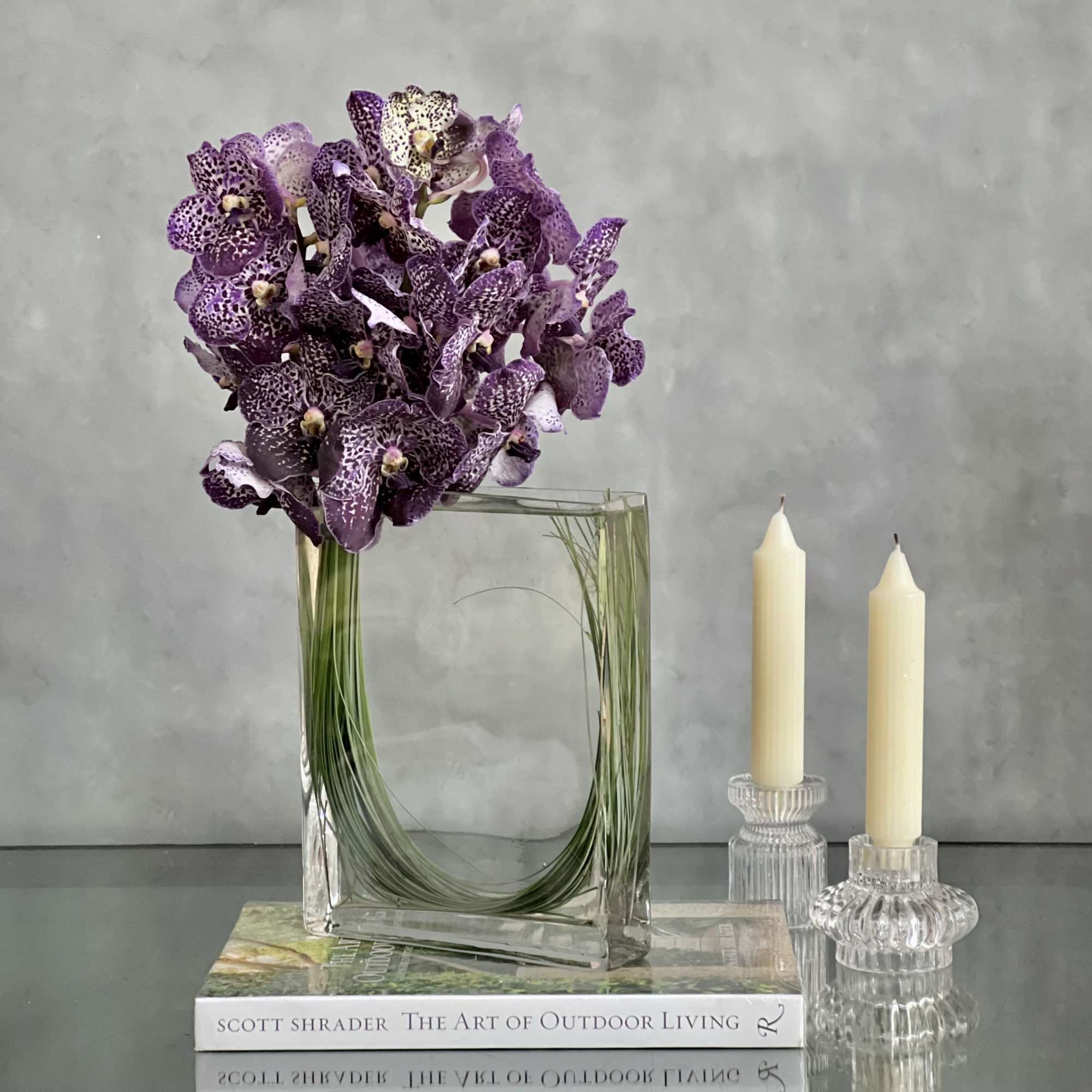 Leopard Like Orchid Blooms in Rectangular Glass Vase. make this display the