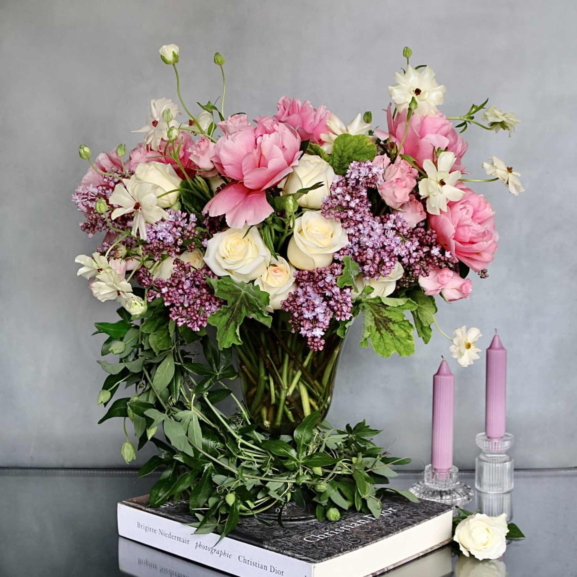 "Ophelia" is a true notion of delicacy. This arrangement consists of Lilacs