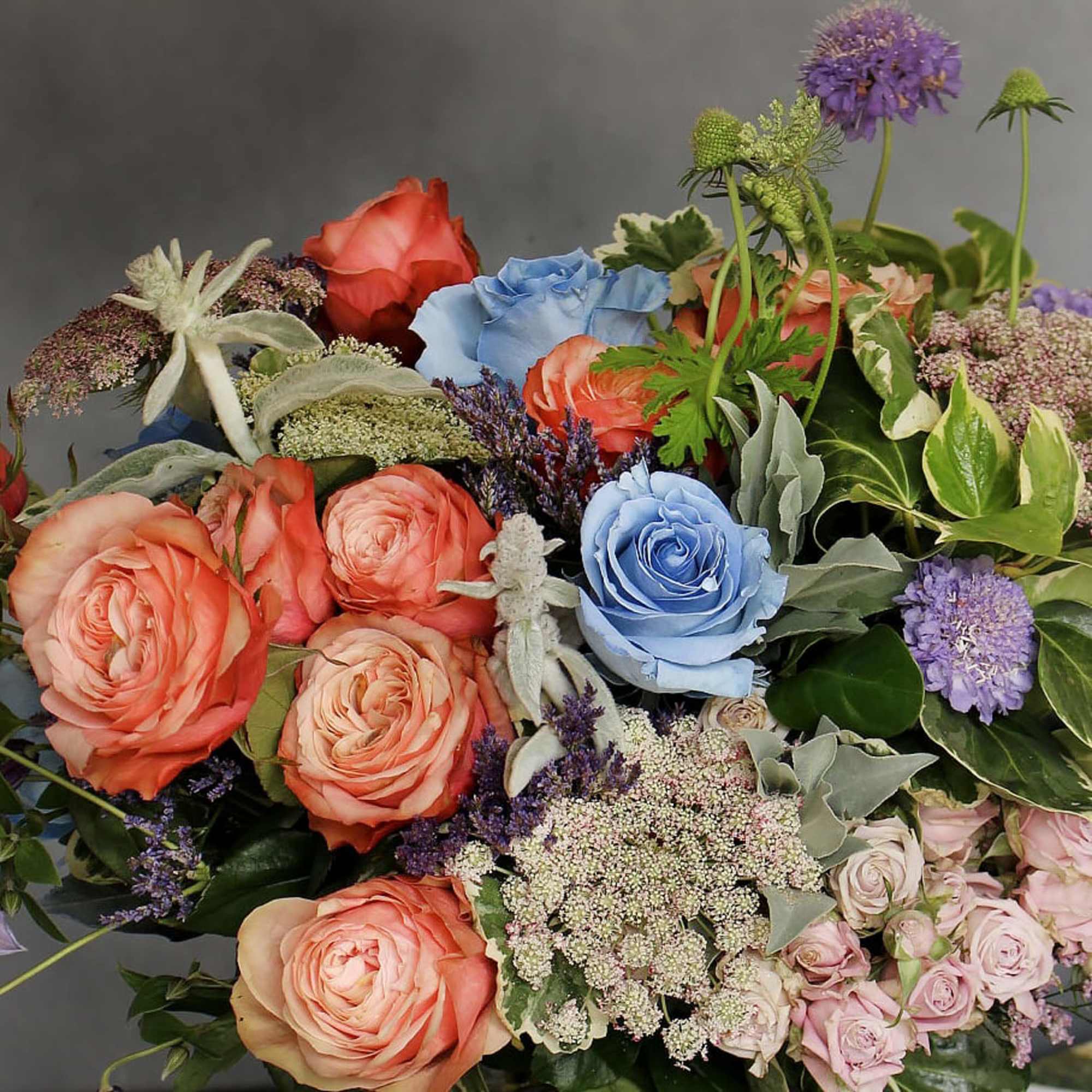 "Quirky" is a unique arrangement filled with various florals in a simple, photo 2 of 4