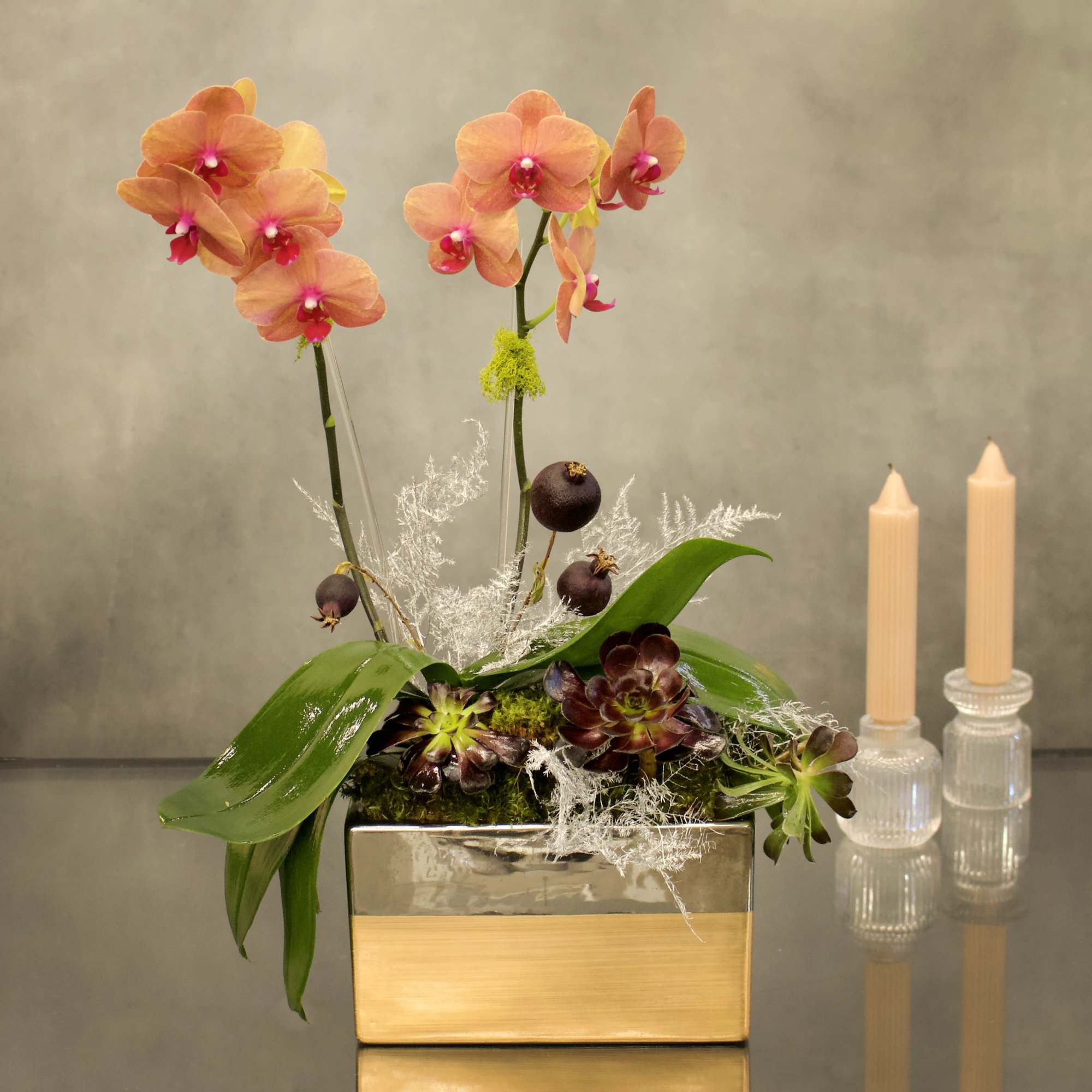 Welcome the fall season with this mini peach orchids nested in the