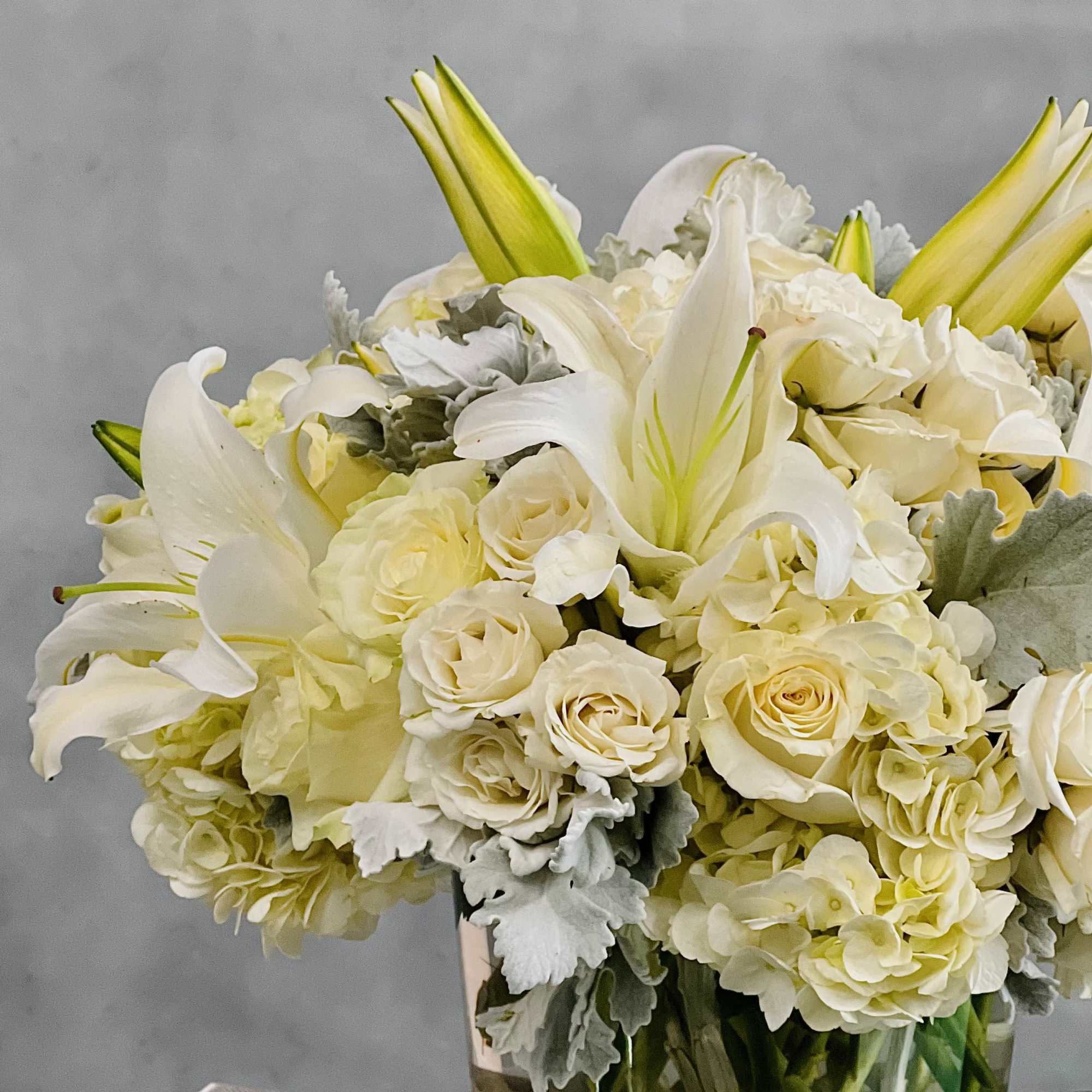 This dreamy white floral mix is heavenly. The cylinder glass vase holds, photo 3 of 4