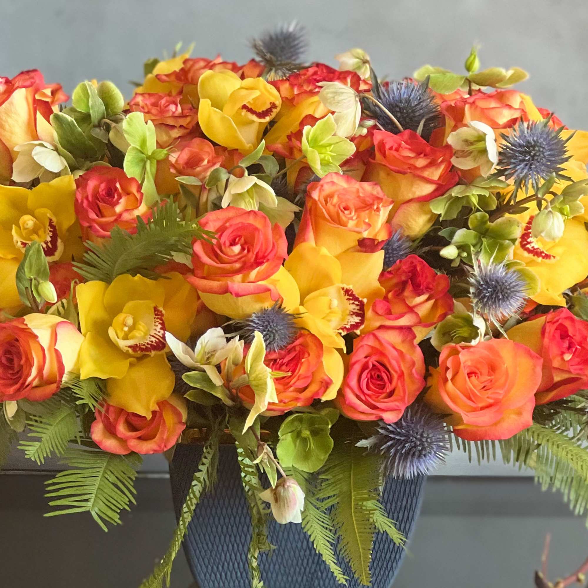 Amidst a cluster of beautiful multi-pigmented Roses of extraordinary hues are artfully, photo 2 of 3