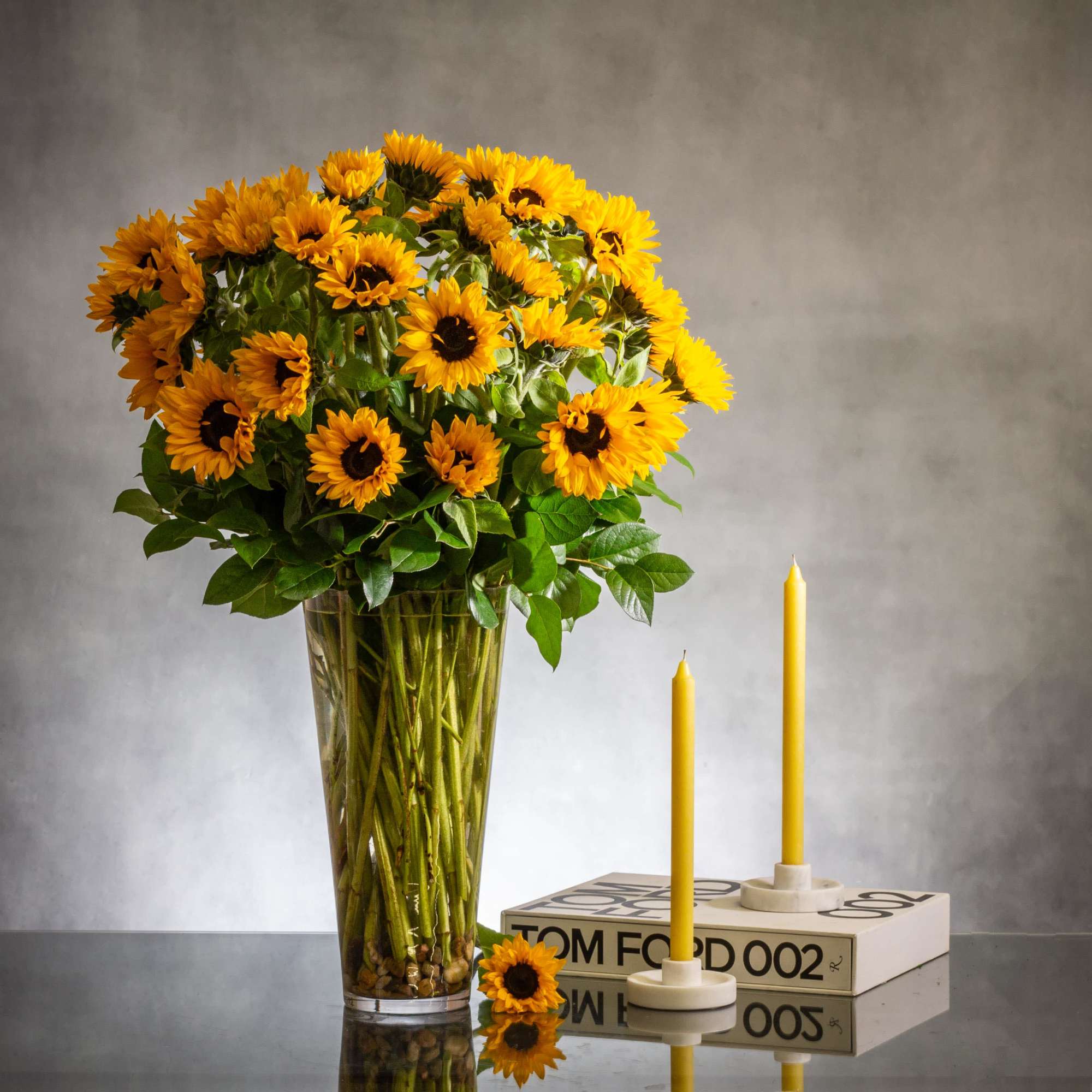This  combination of rustic and modern sunflower and cymbidium orchids arrangement