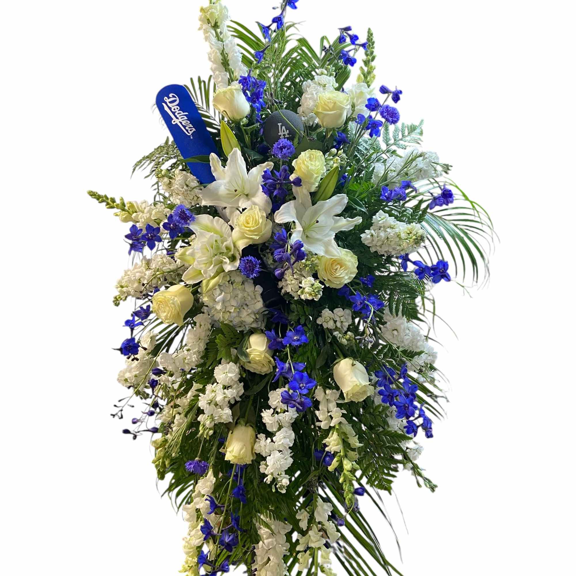 Tall white and blue floral standing spray with roses and lilies
