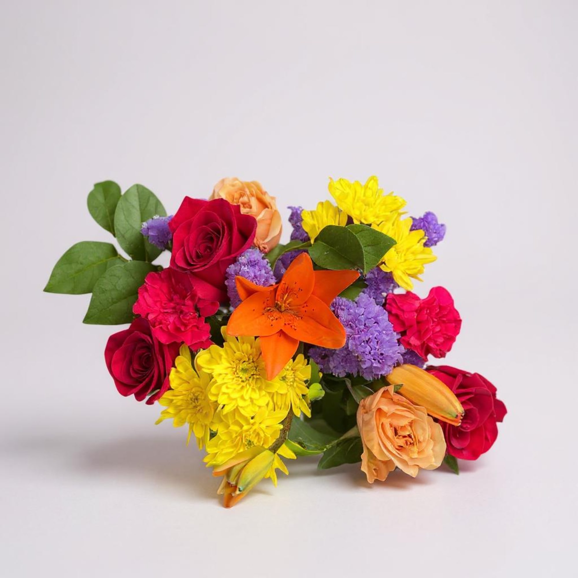 Mixed bouquet with roses, lilies, chrysanthemums, and carnations