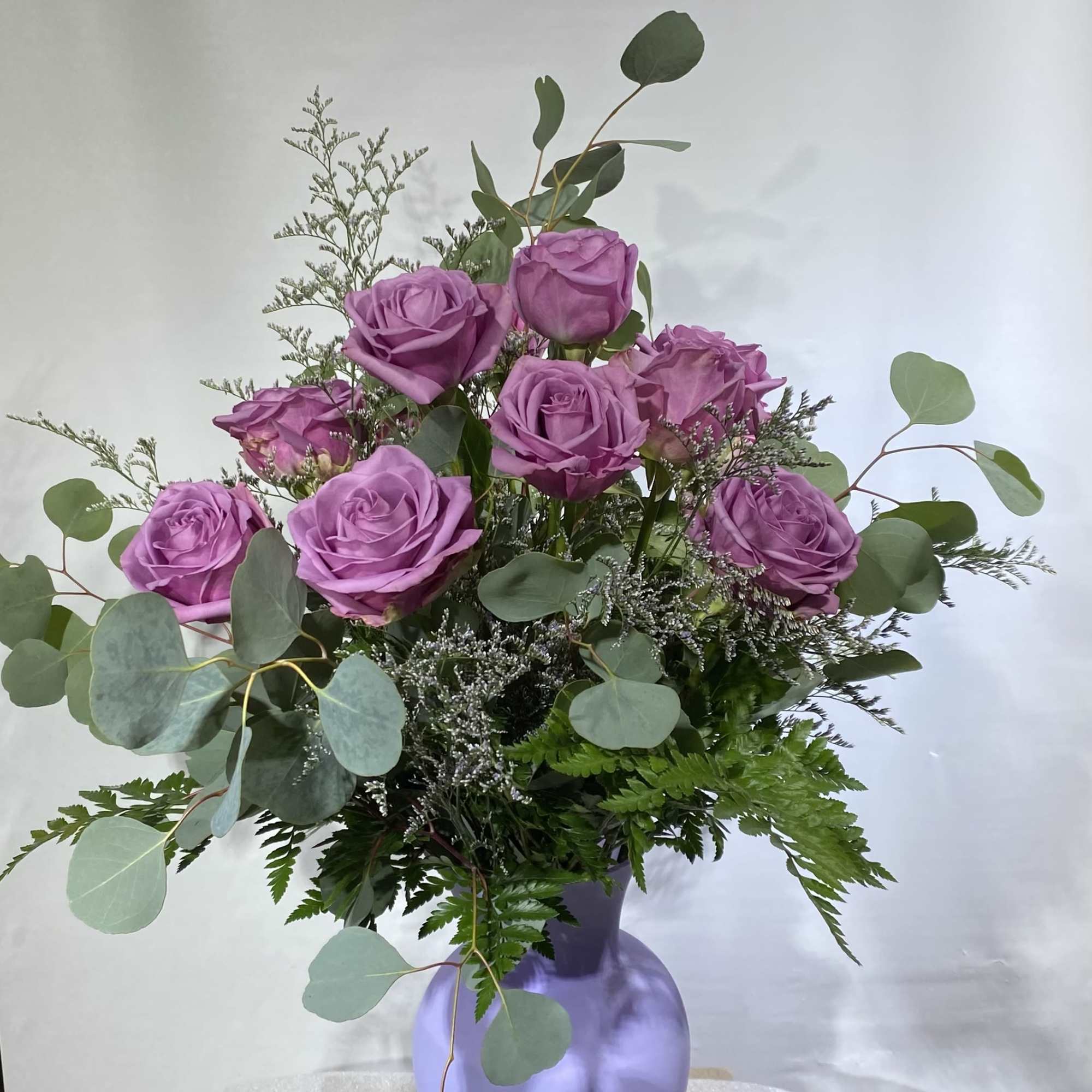 This arrangement is the perfect "pick me up" to brighten someone's day.