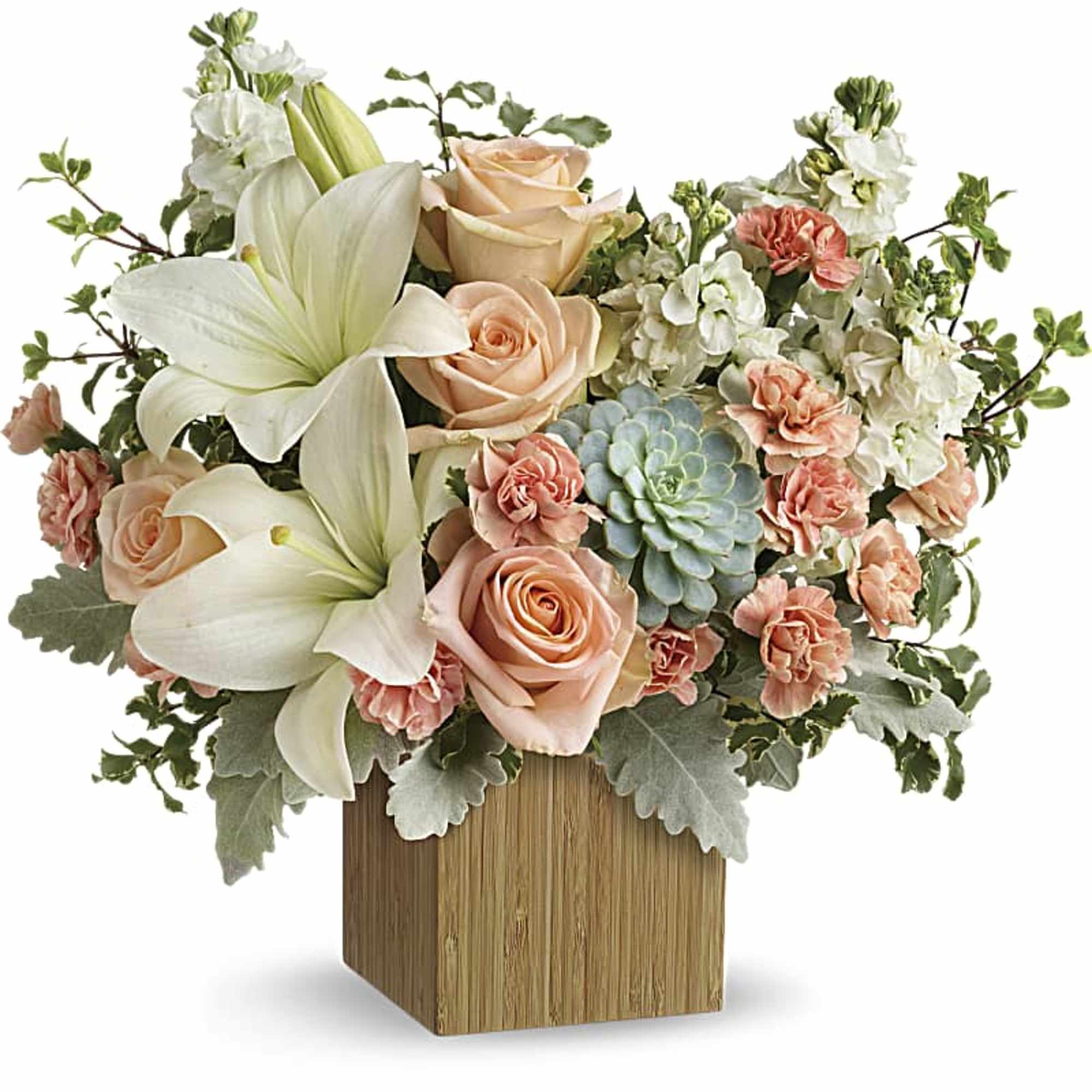 Peach roses and white lilies in a wooden cube vase