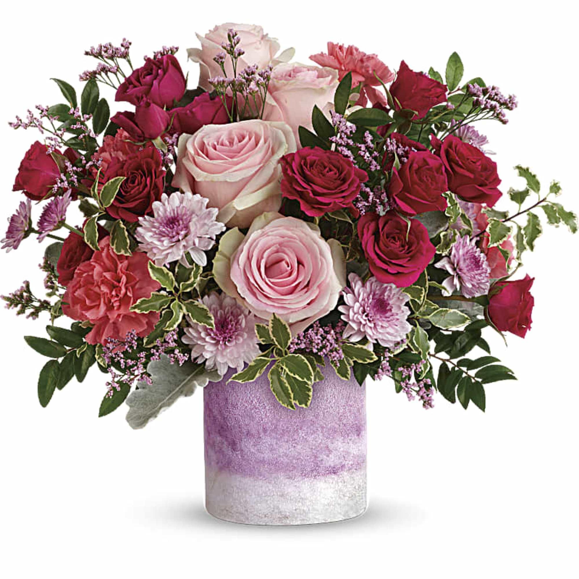 Pink and red rose bouquet in a lavender vase
