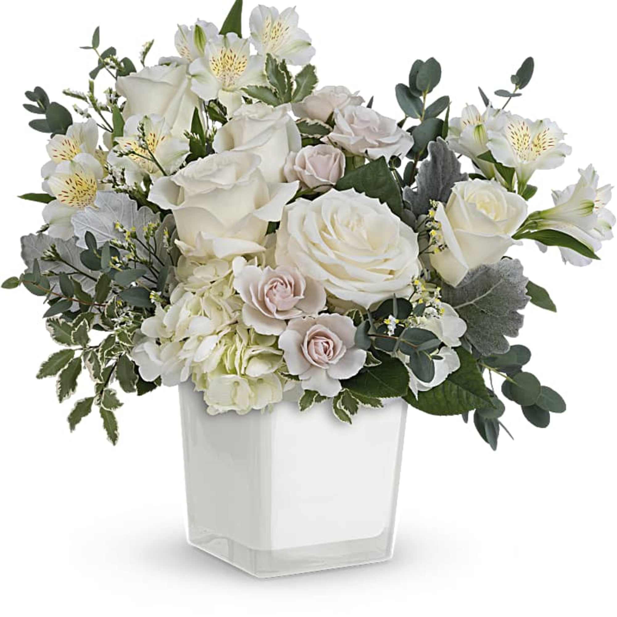 White rose and alstroemeria arrangement in a clear square vase