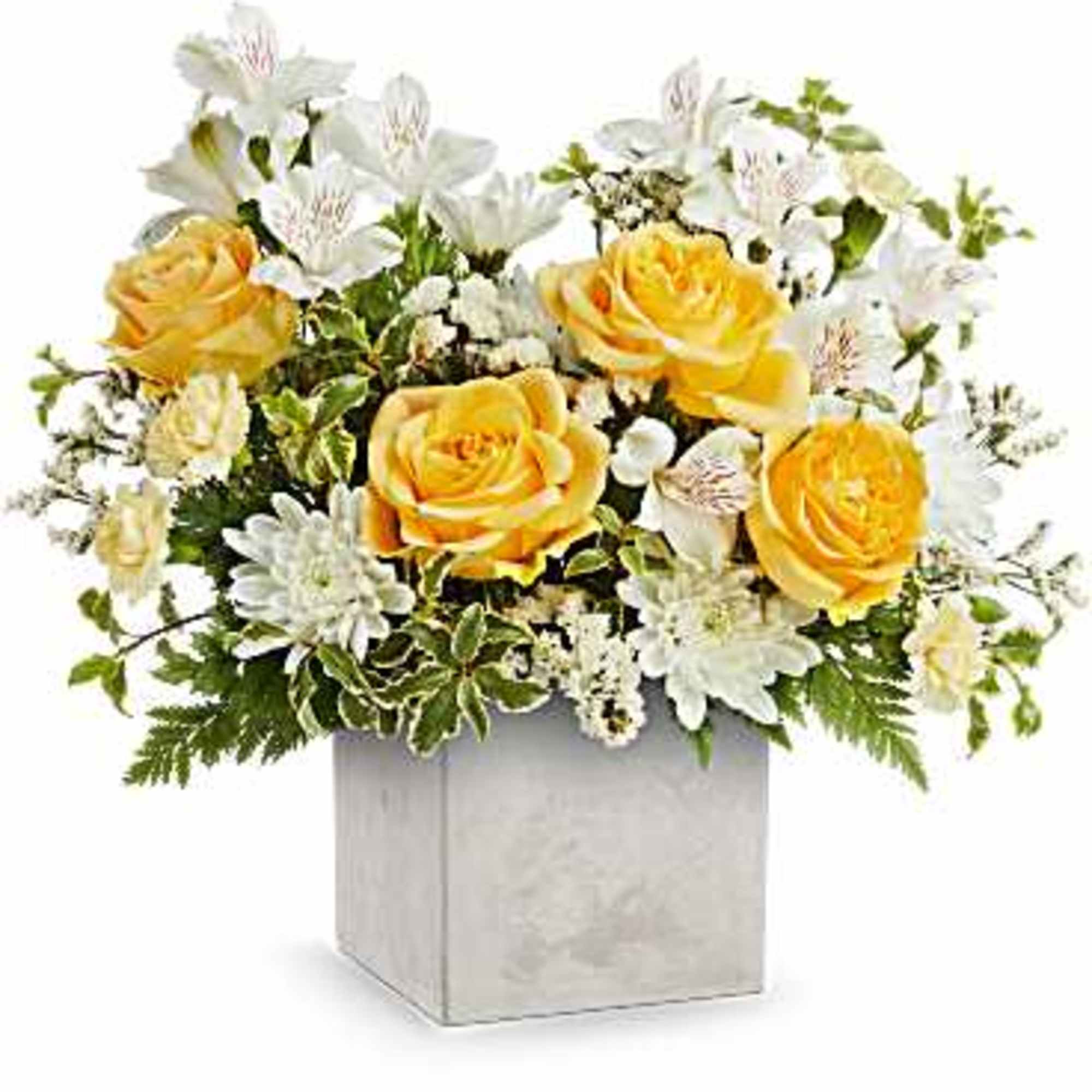 Yellow roses and white flowers in a square vase